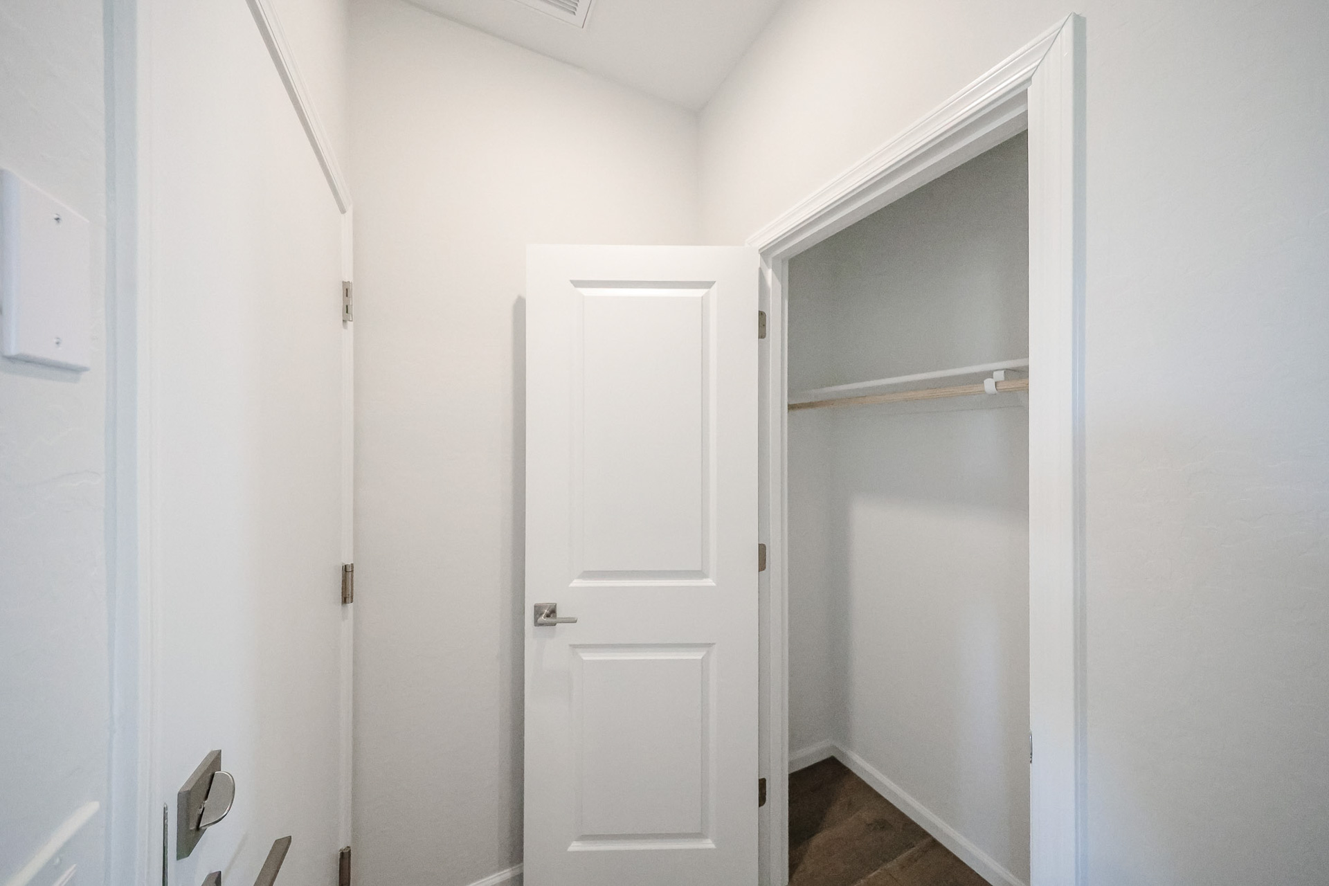 A white door in a room.