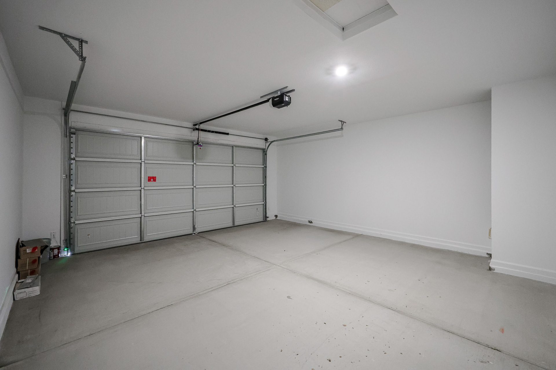 A room with a large metal gate.