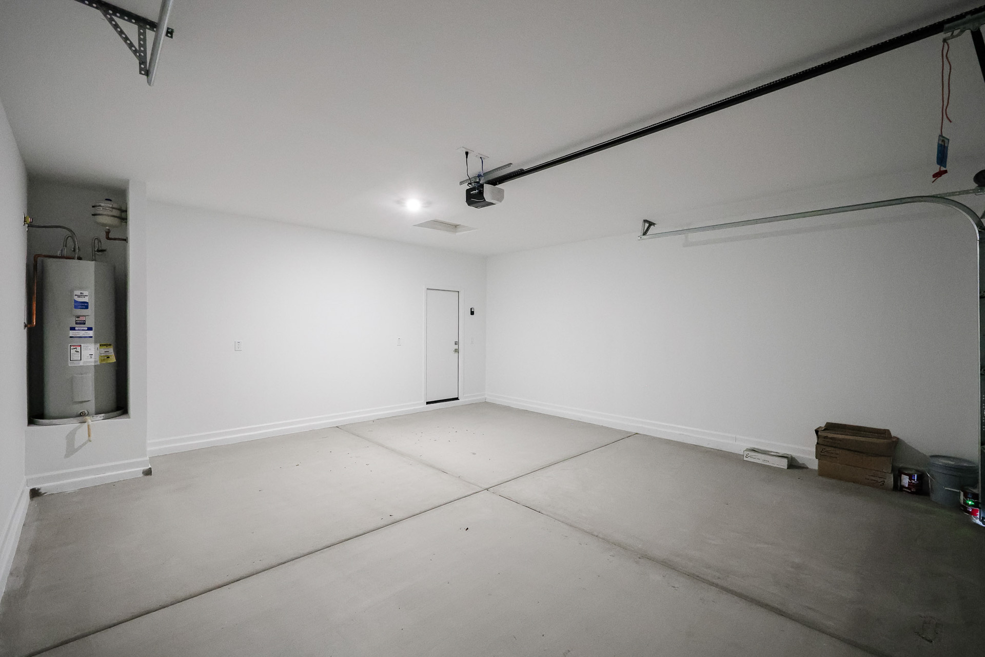 A room with a white wall and a white floor.