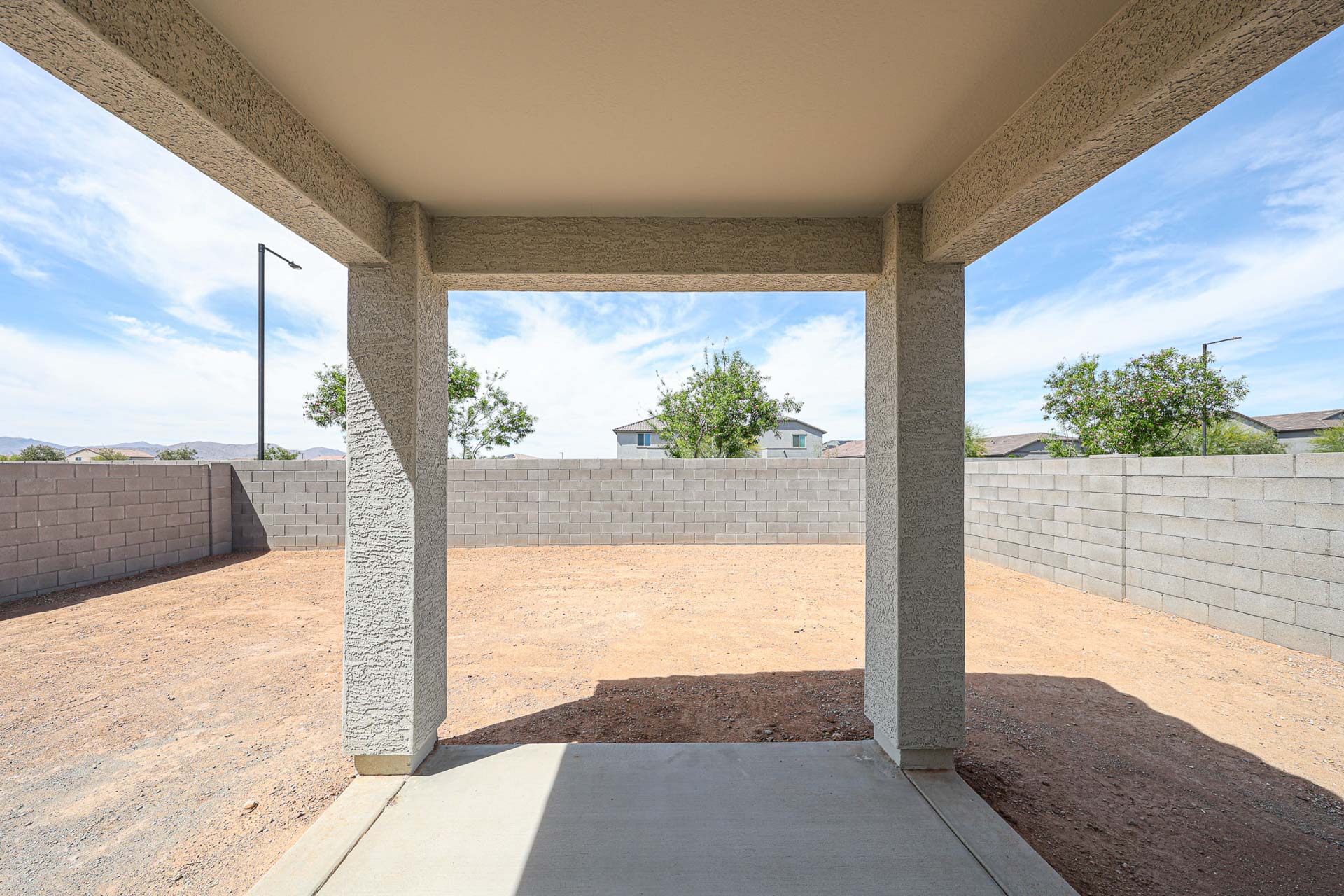A concrete structure with pillars.