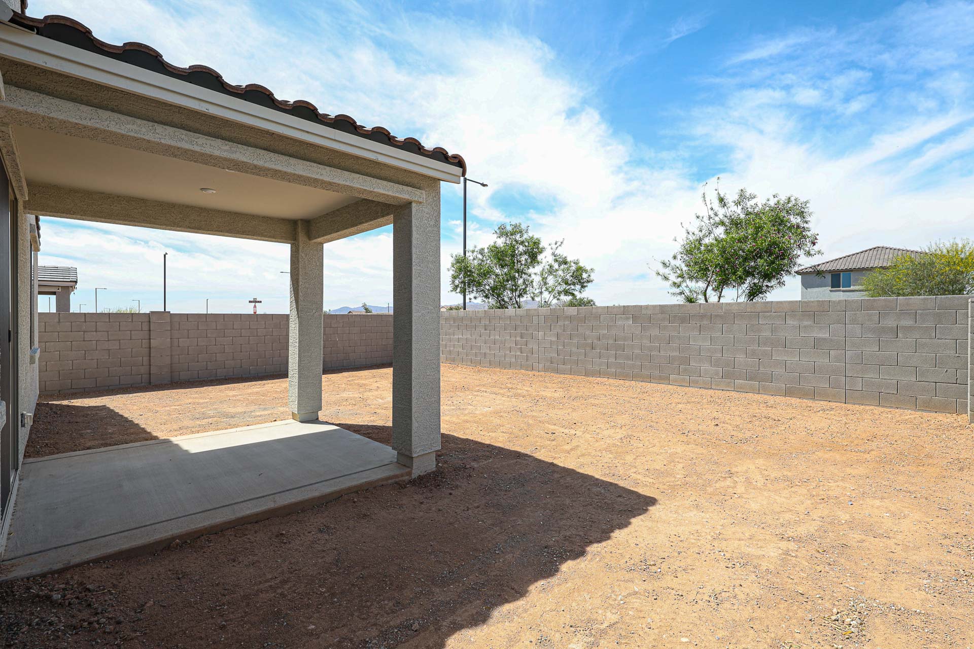 A concrete structure with a roof.