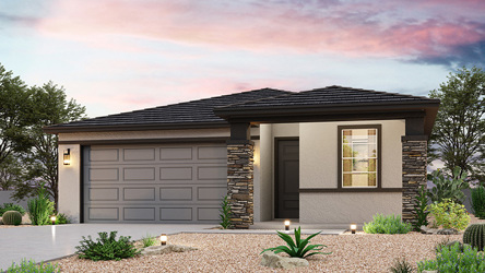 A house with a gravel driveway.