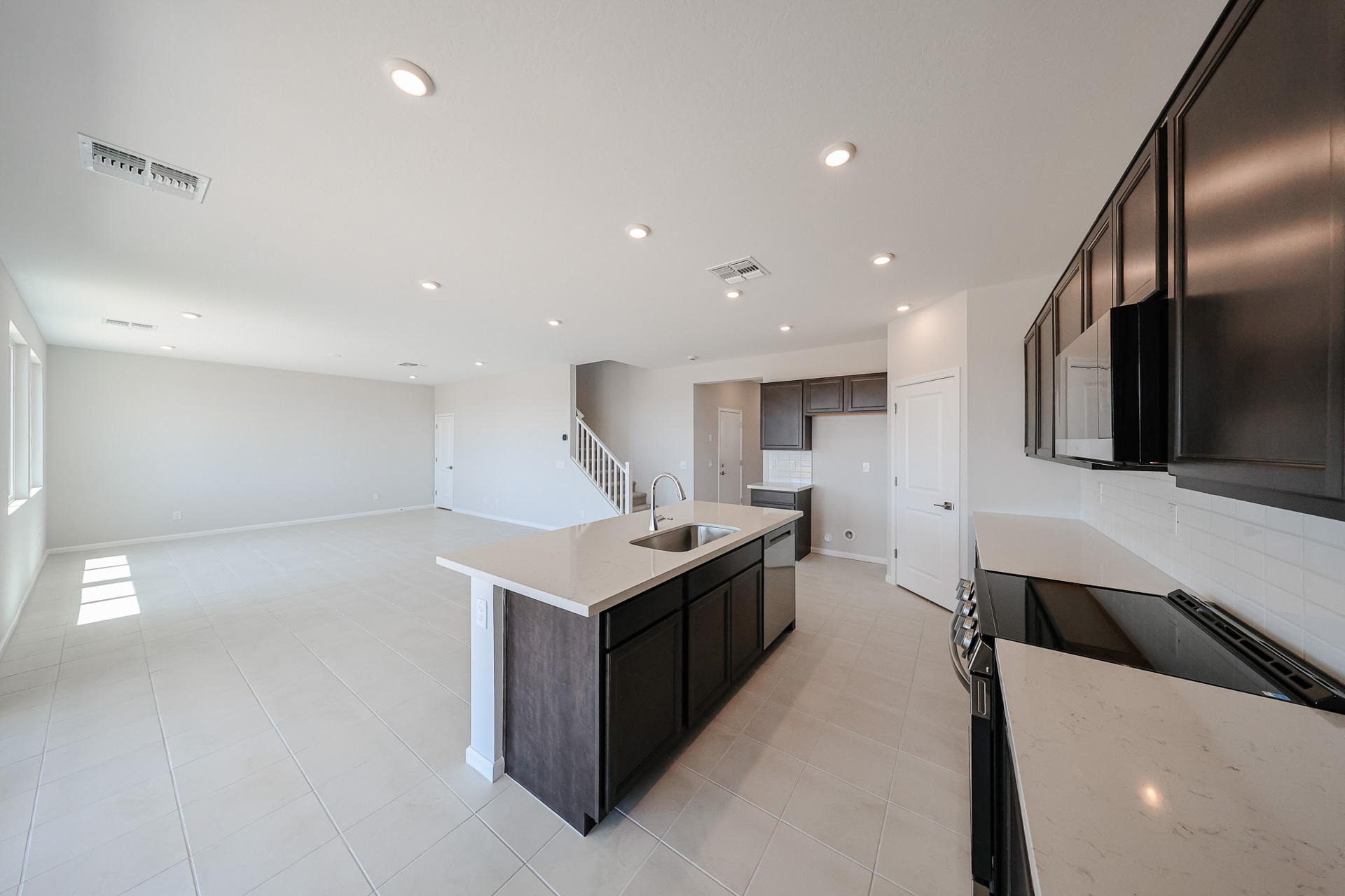 A kitchen with a large island.