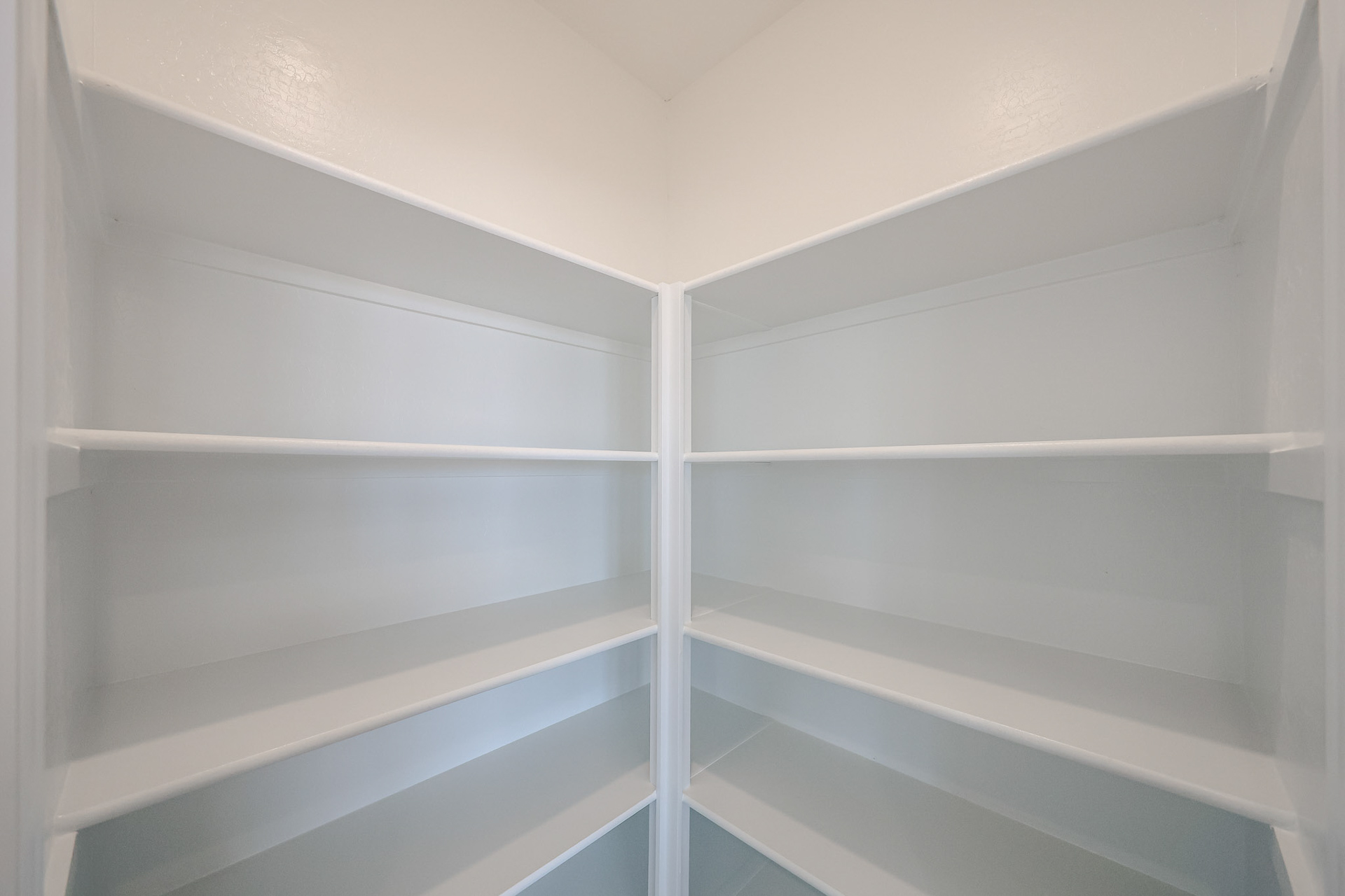 A white shelf with white shelves.