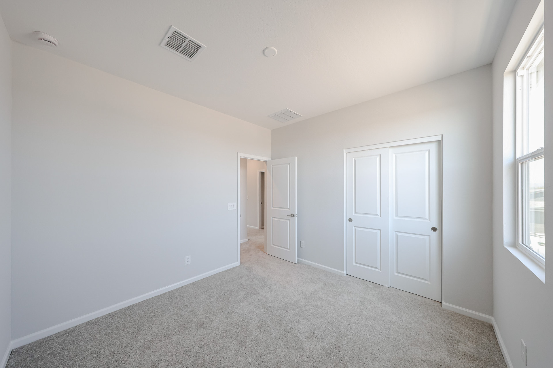 A room with white doors.