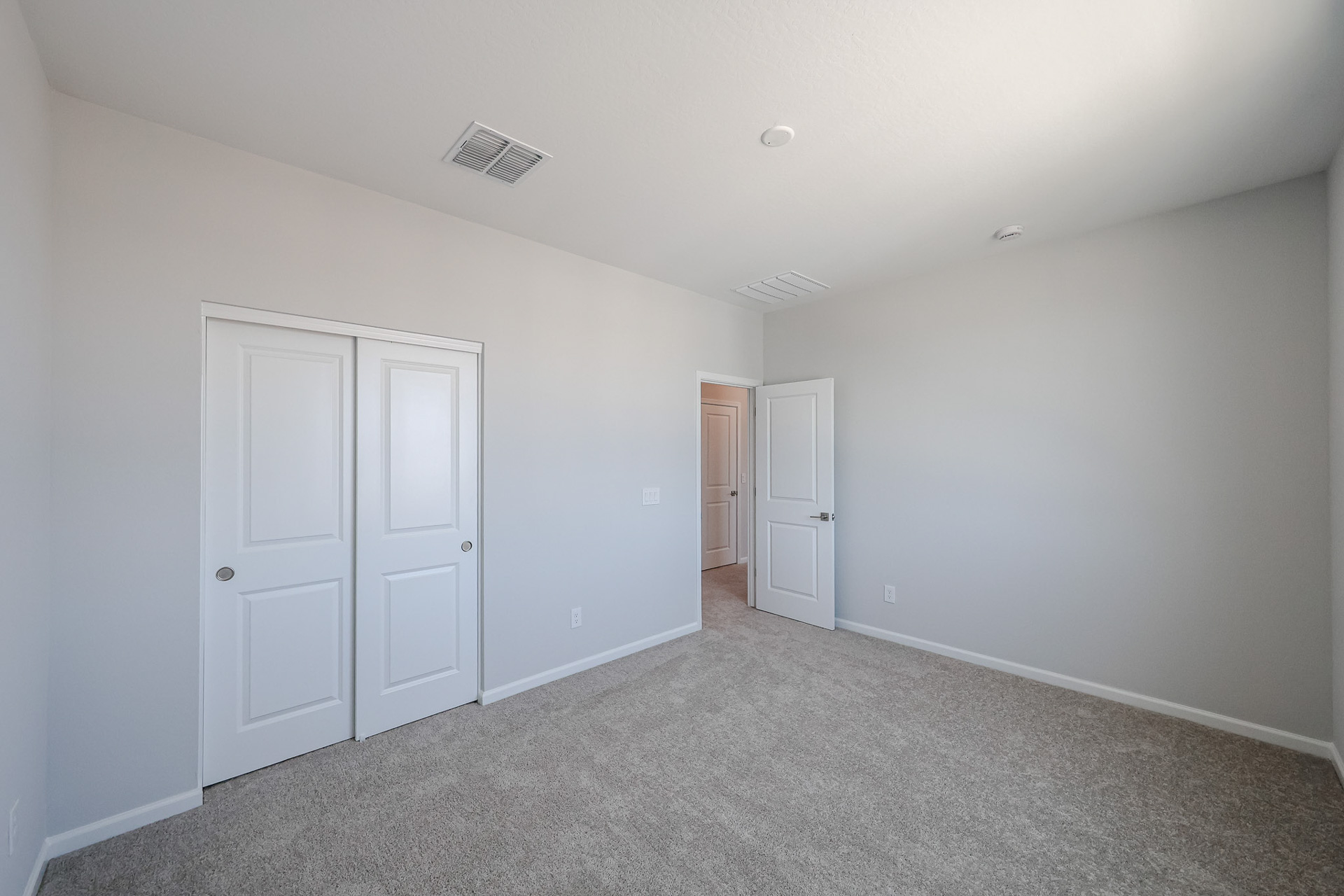 A room with white doors.