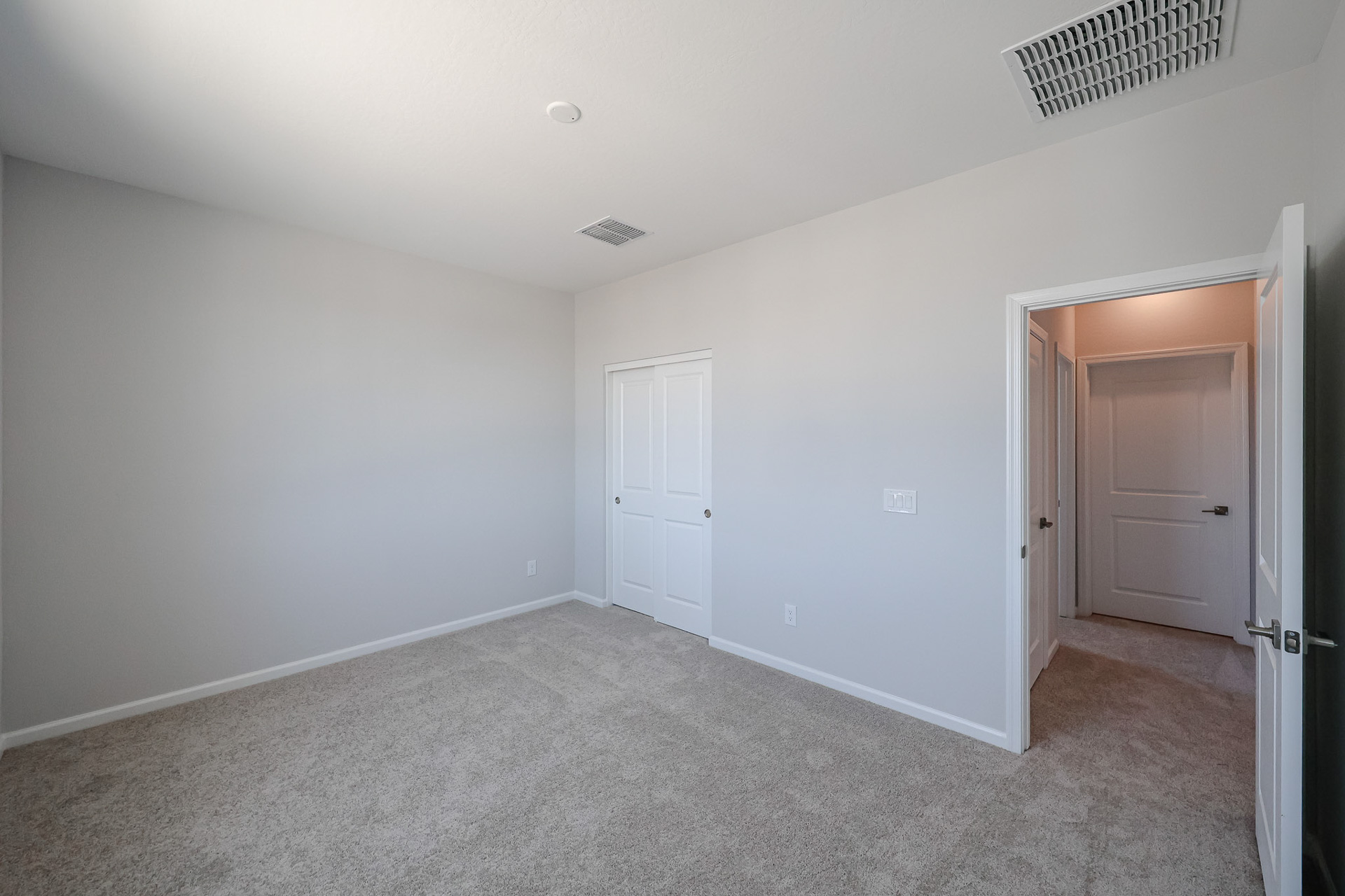 A room with white doors.