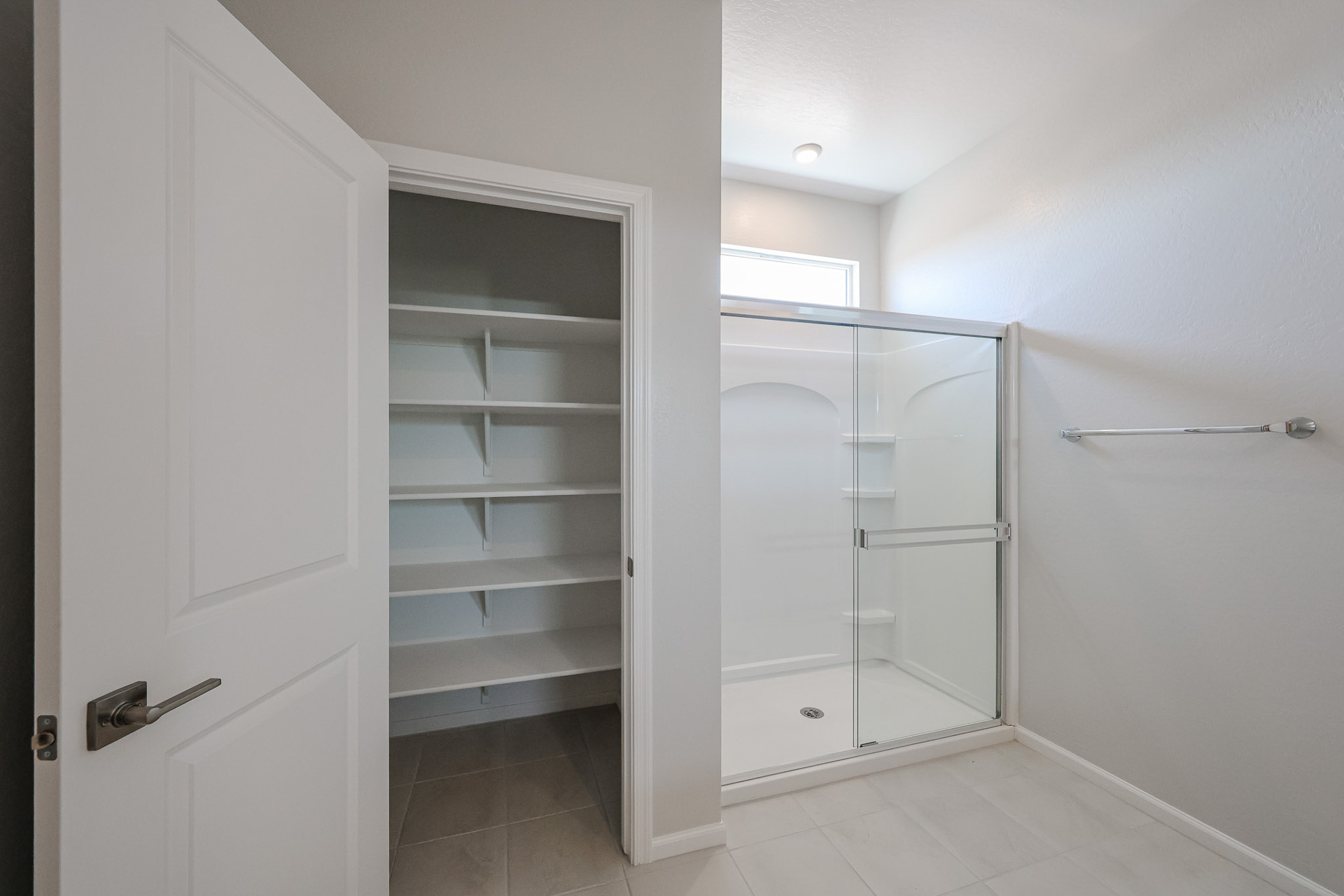 A shower unit in a room.