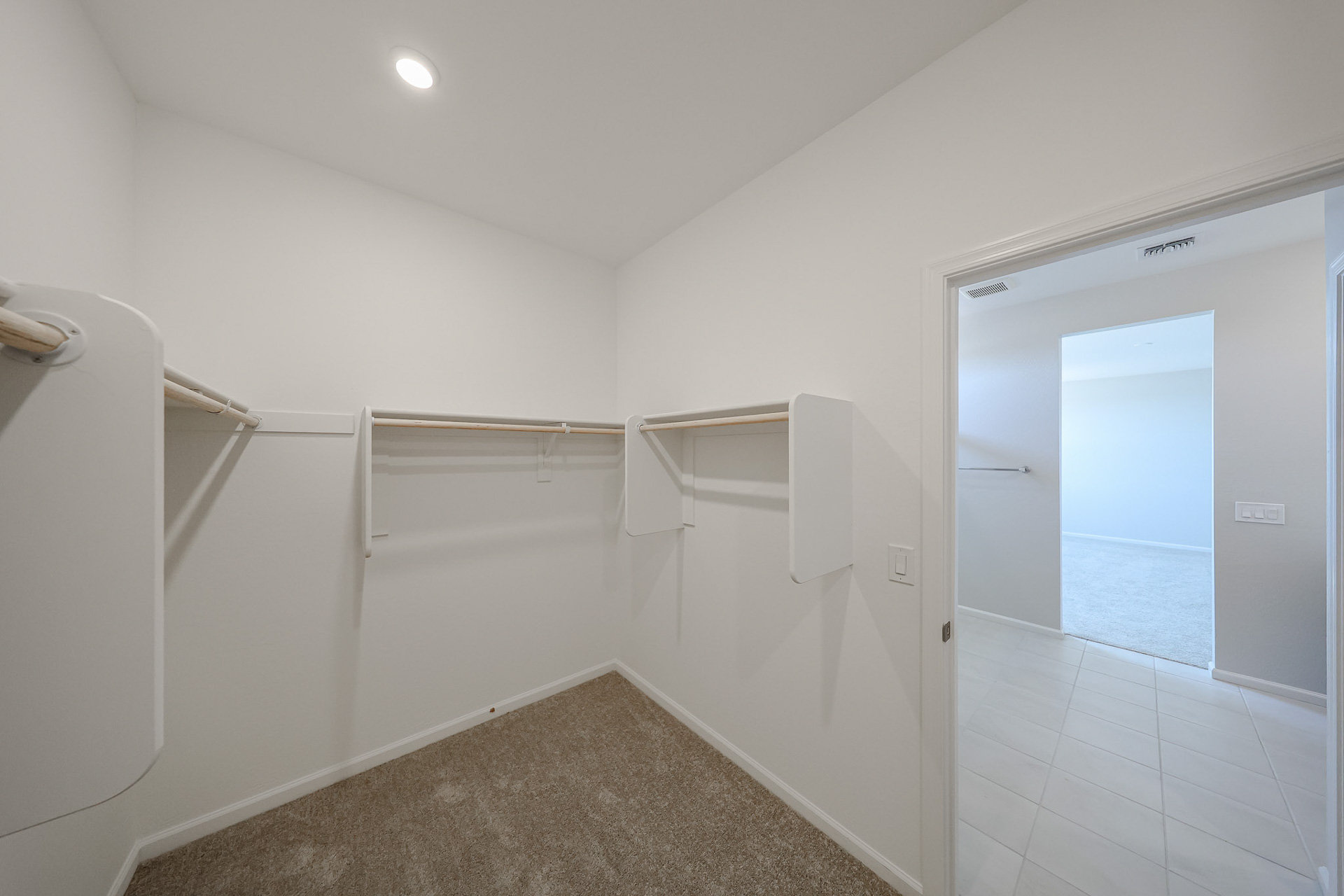 A bathroom with a shower unit.