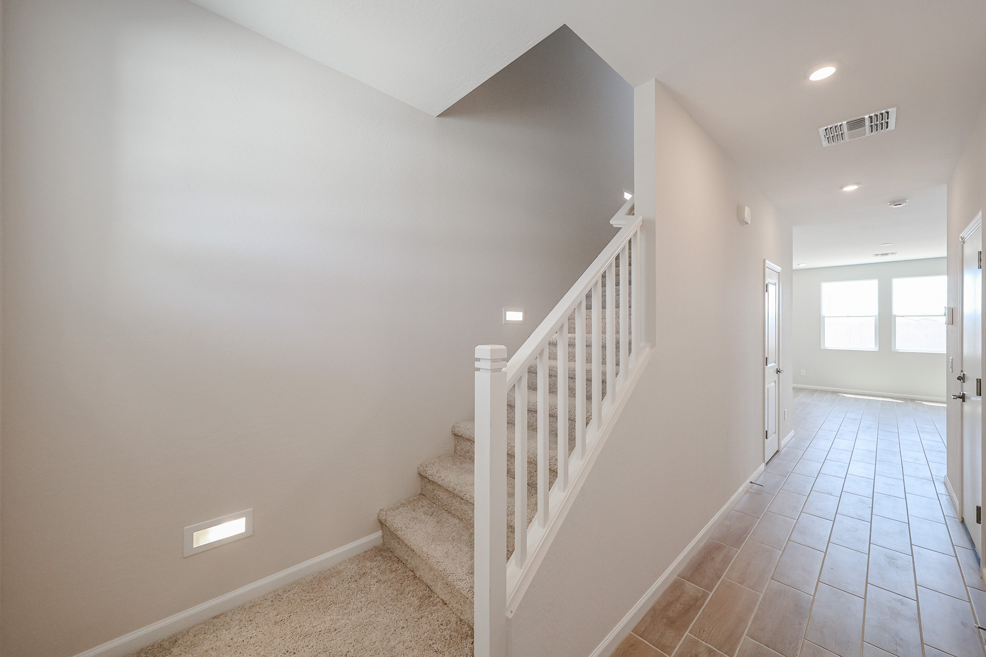 A white staircase in a house.