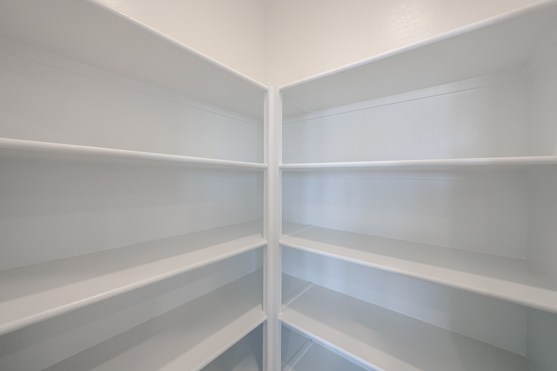 A white shelf with white shelves.
