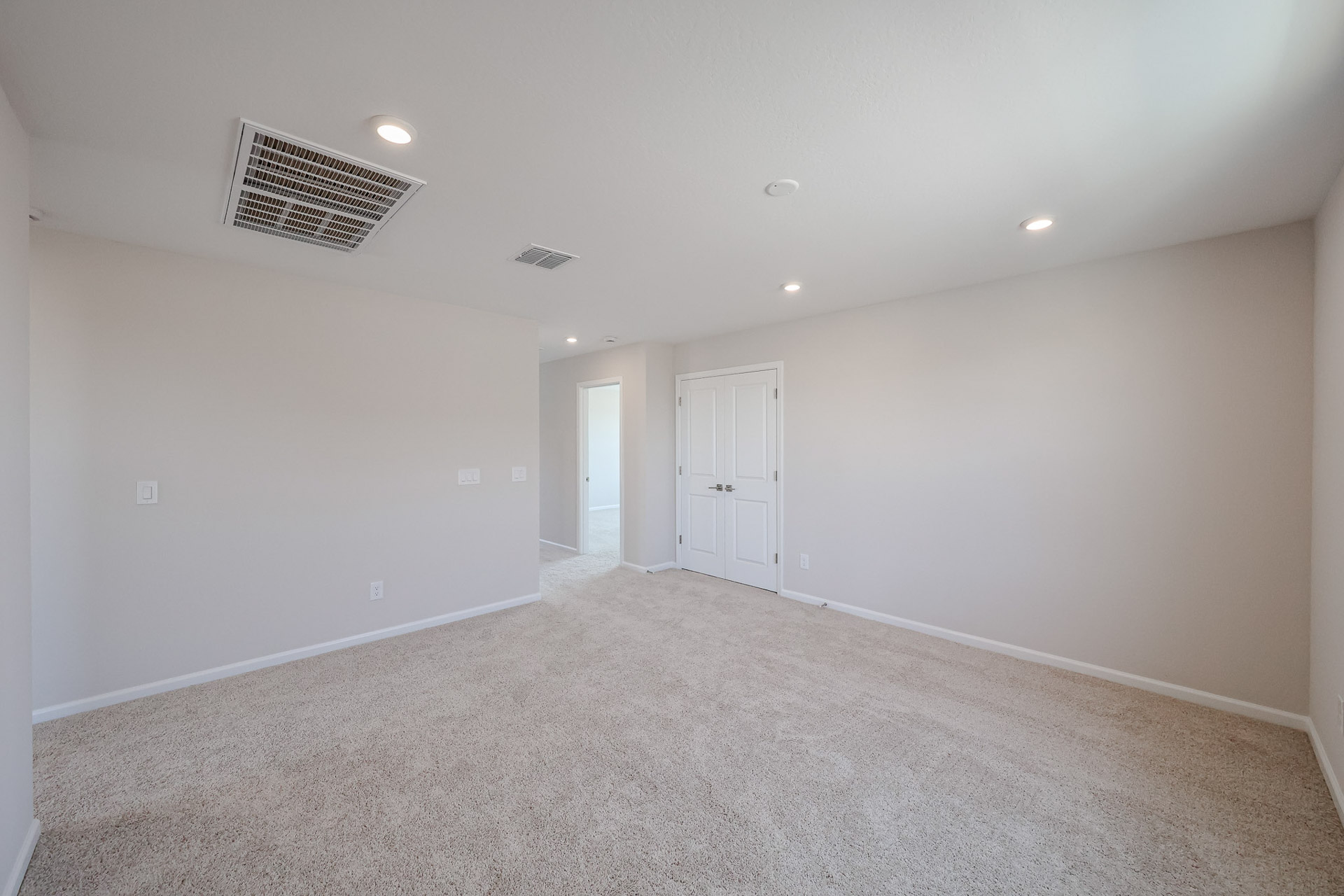 A room with white doors.