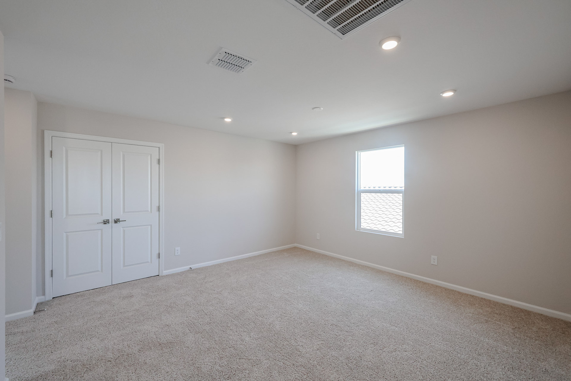 A room with white doors.