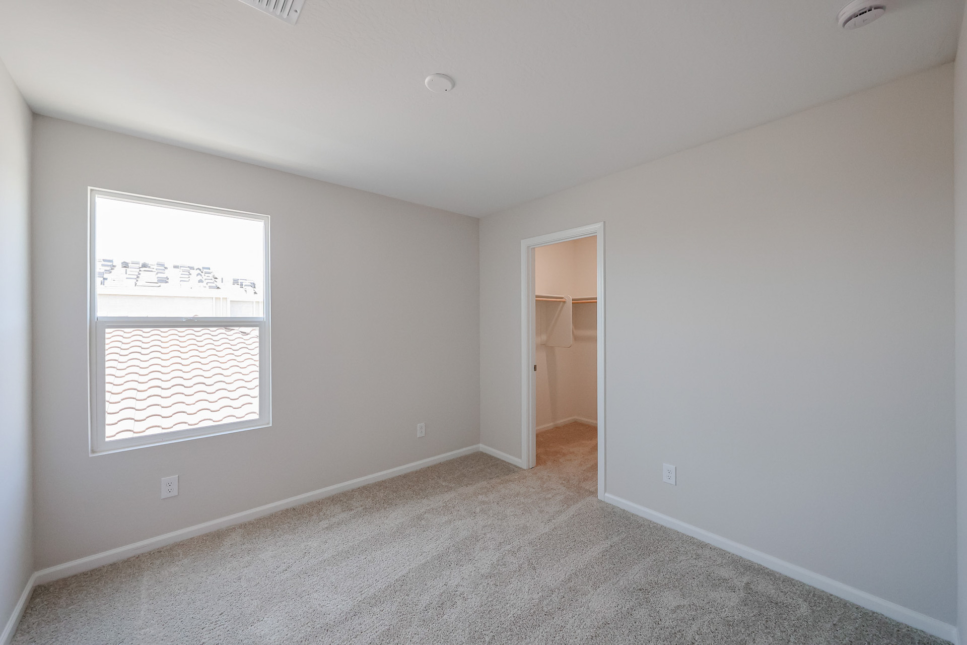 A hallway with a door.