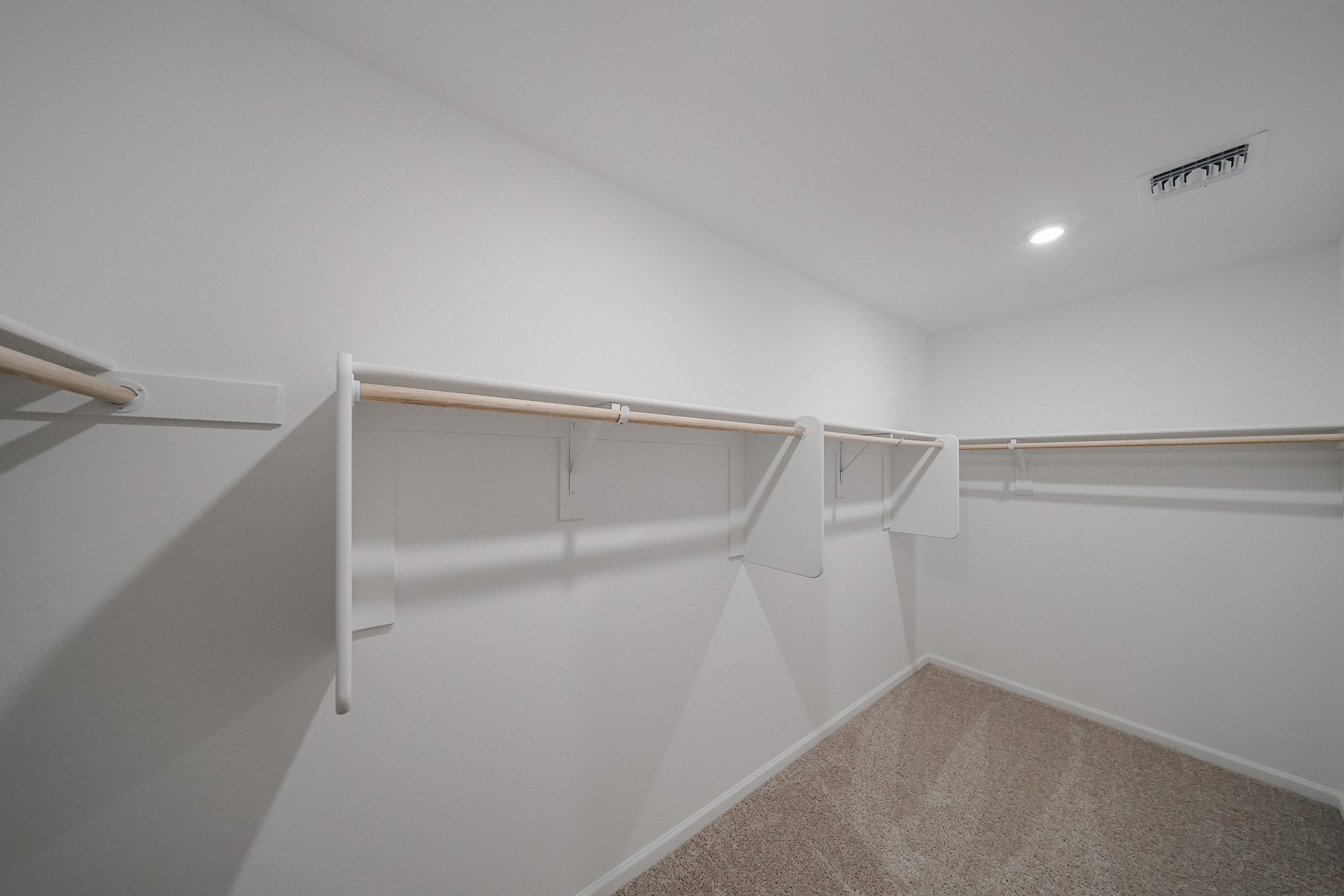 A white staircase in a room.