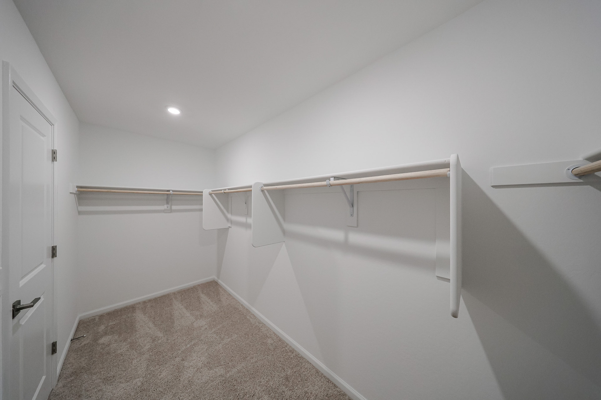 A white room with a white wall.