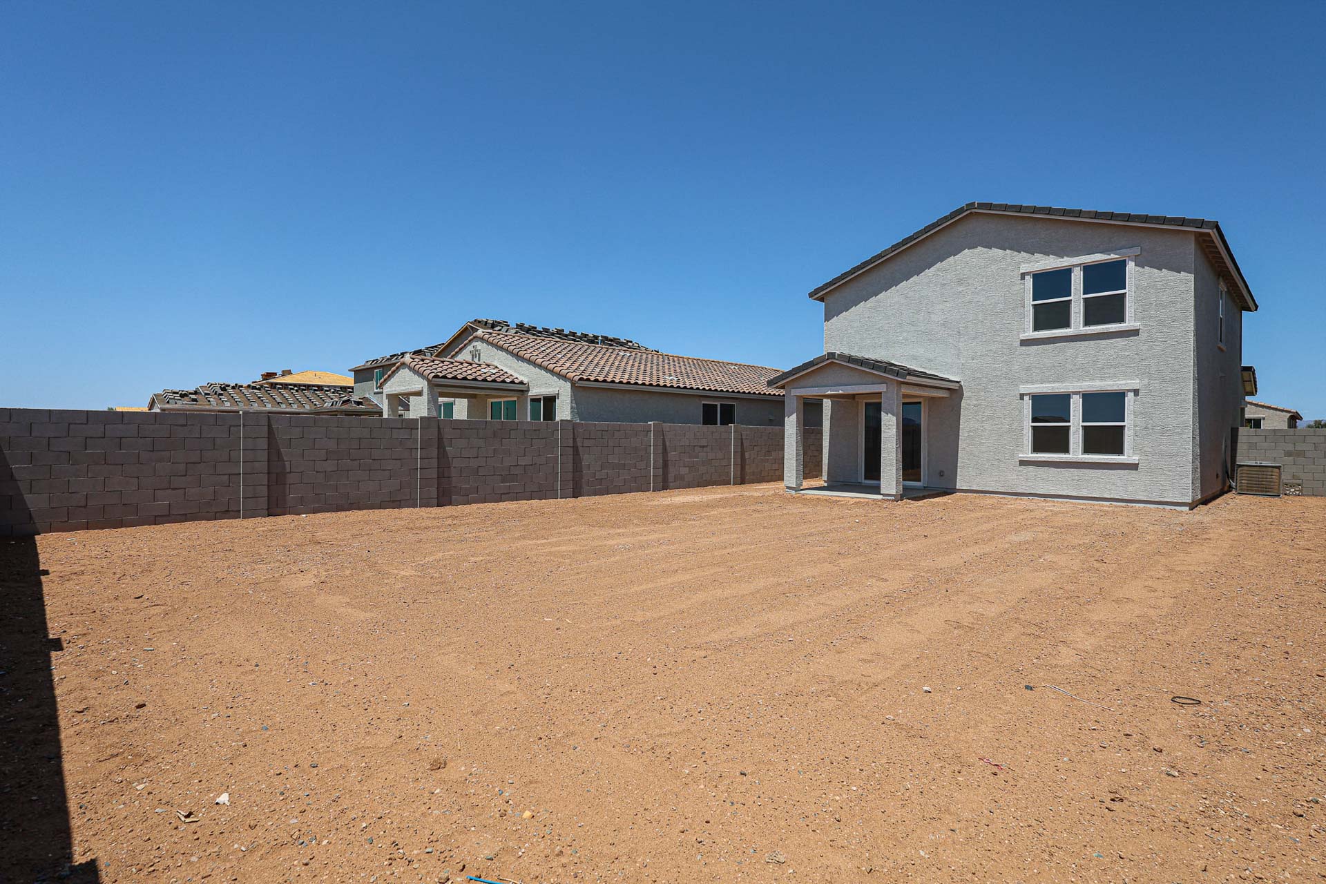 A house with a fence around it.