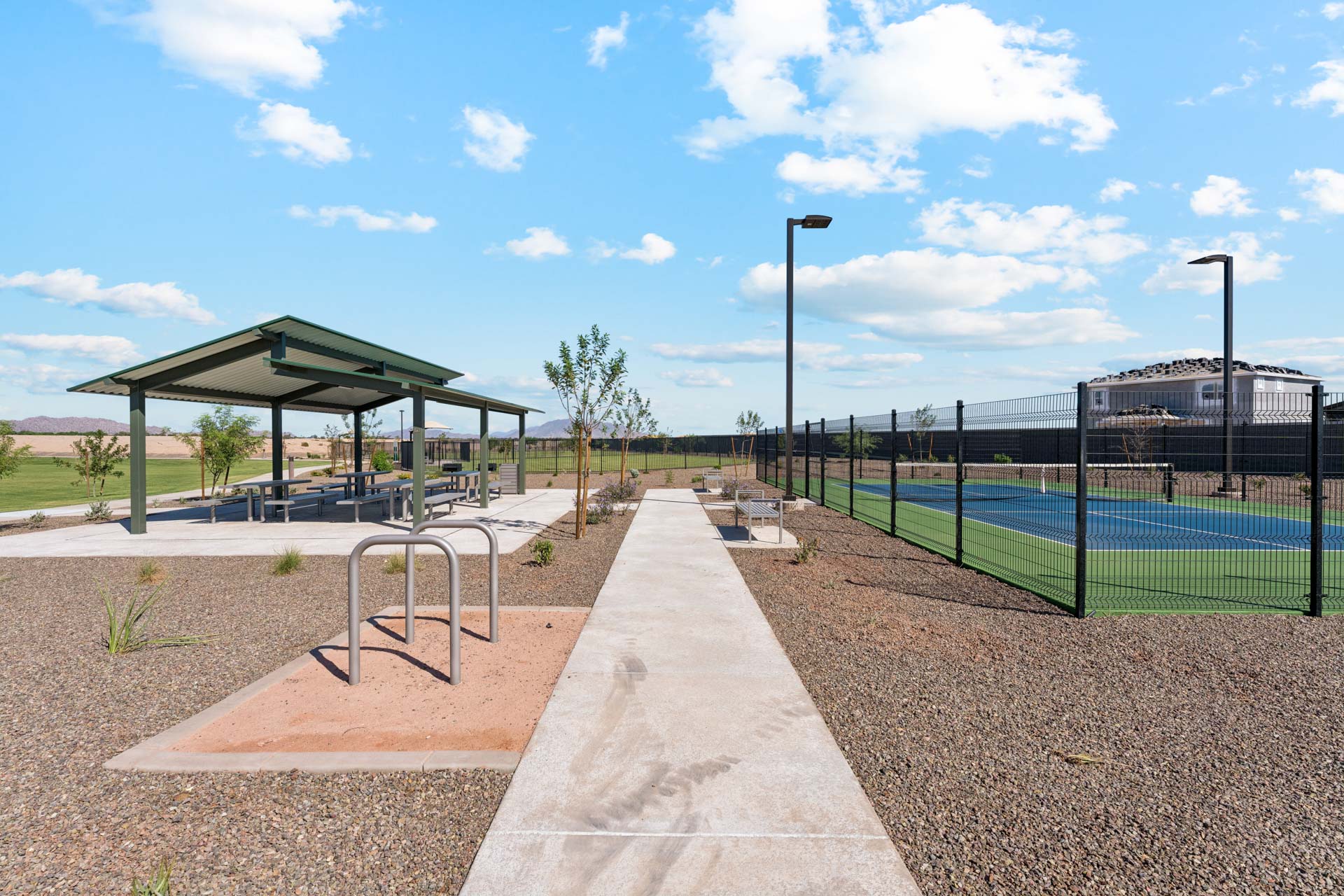 A paved area with a covered area.