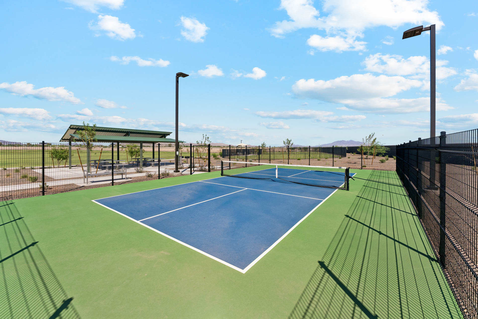 A tennis court with a net.