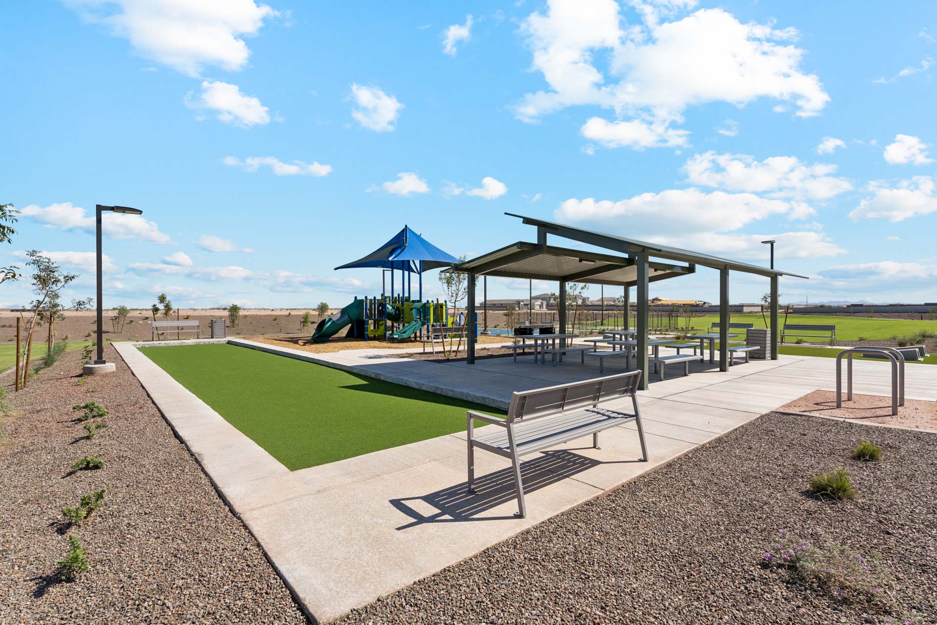 A golf course with a gazebo.
