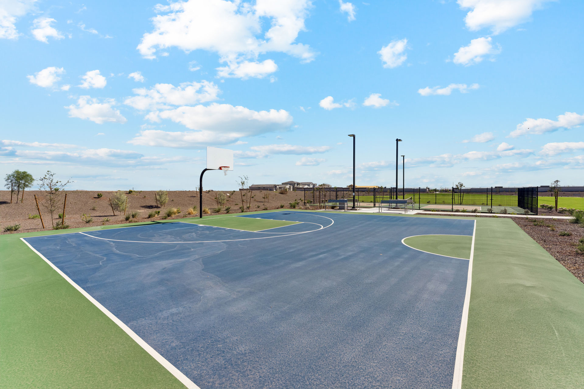 A basketball court with a basketball hoop.