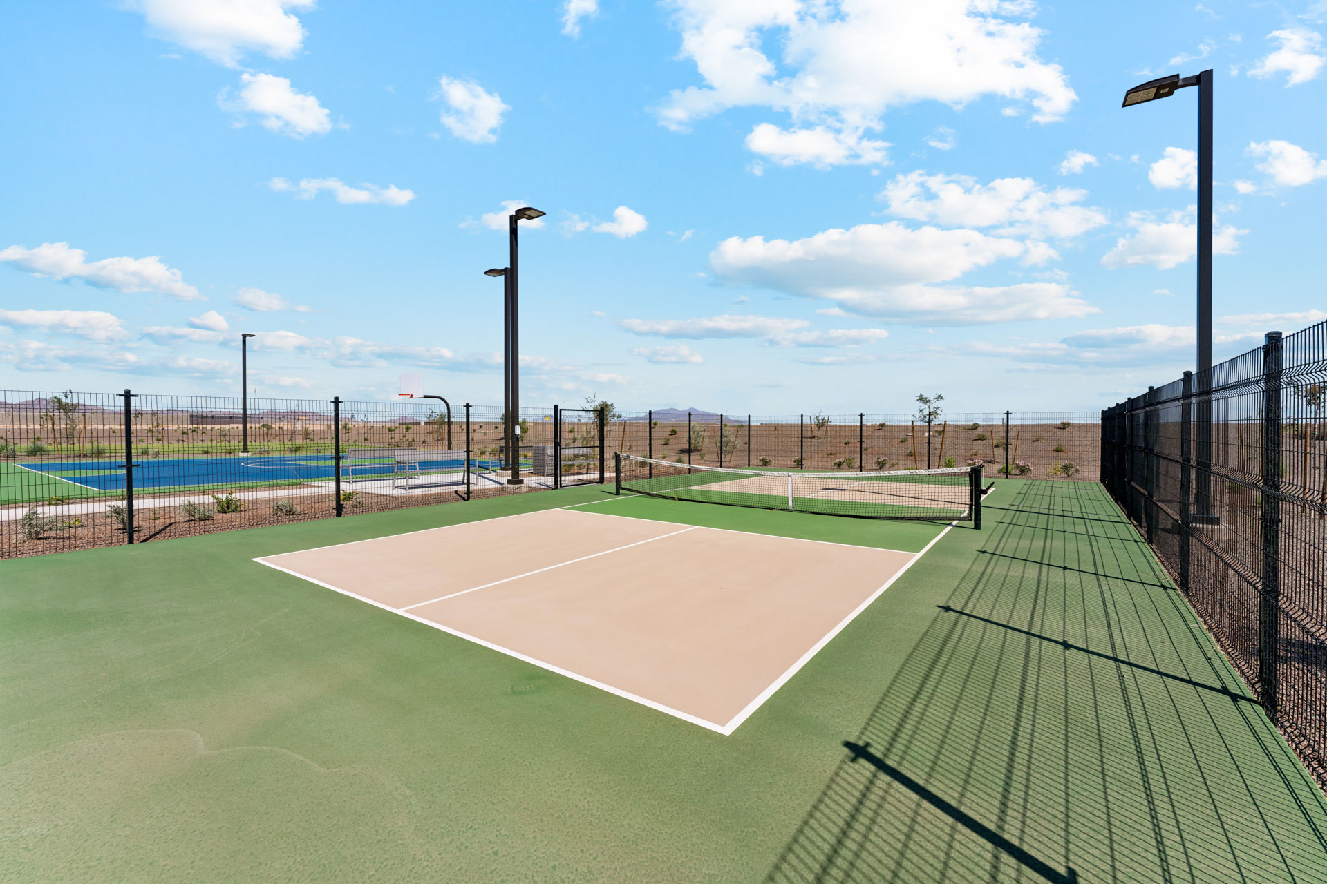 A tennis court with a net.
