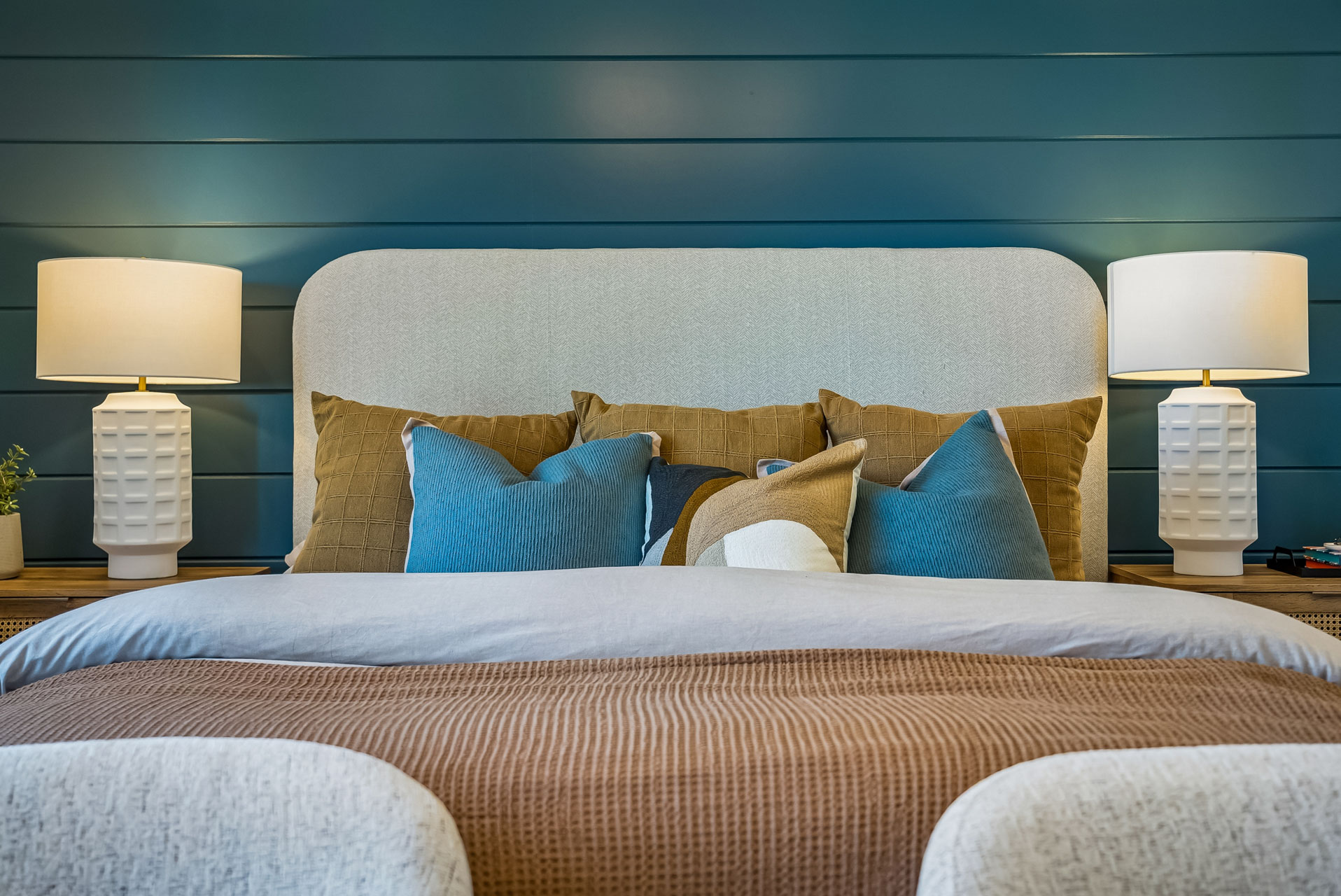 A couch with pillows.