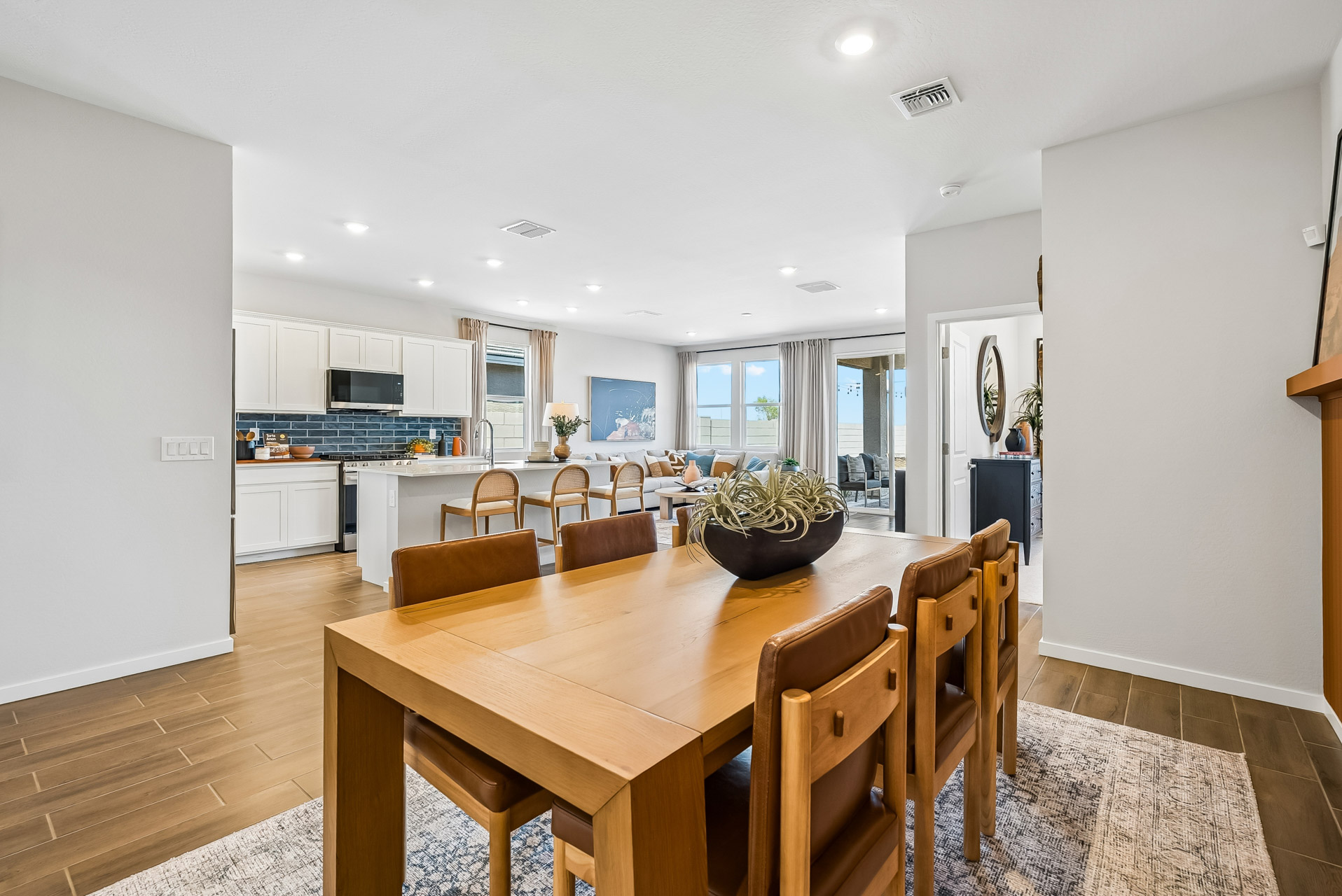 A kitchen with a dining table.