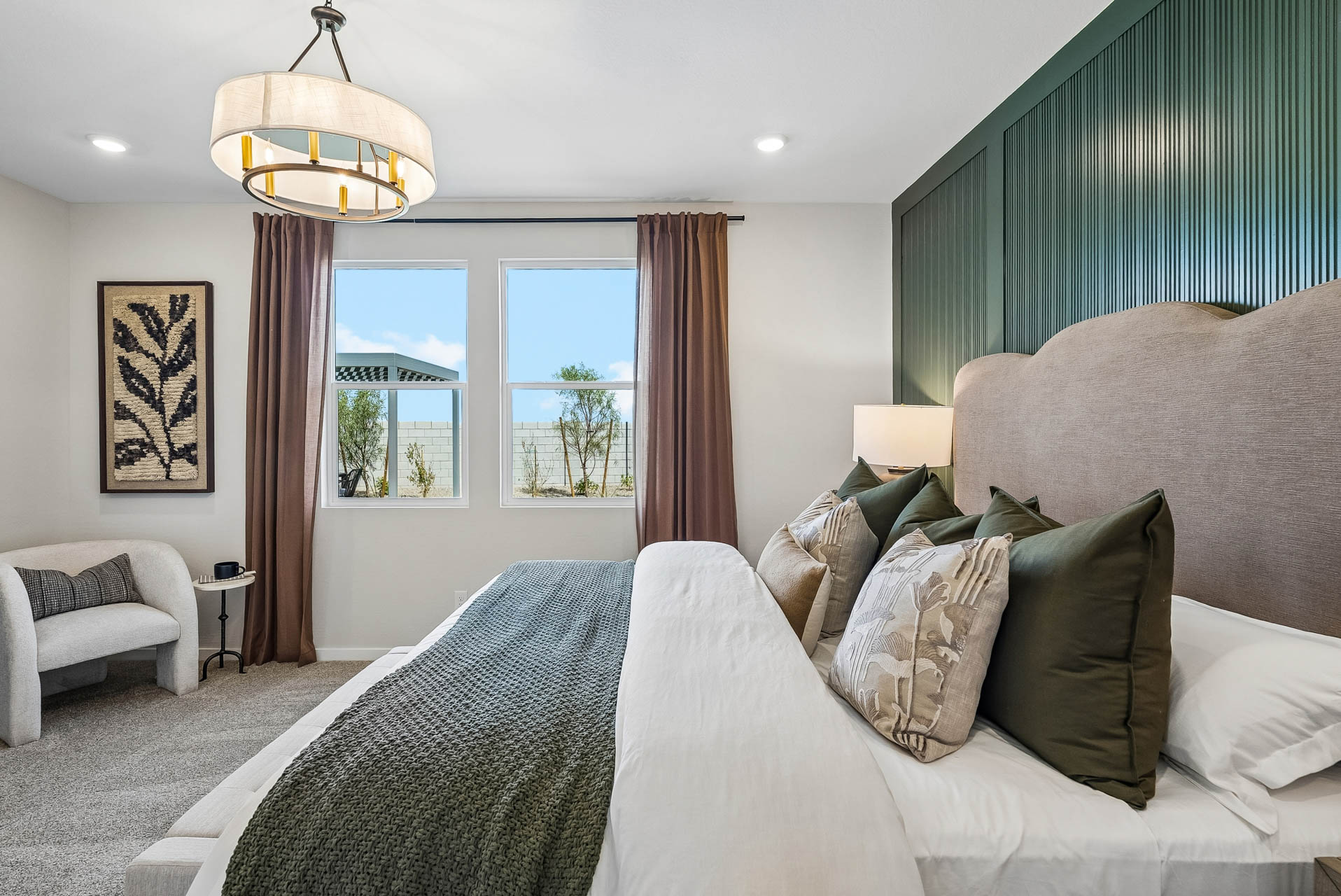 A room with a bed and a window.