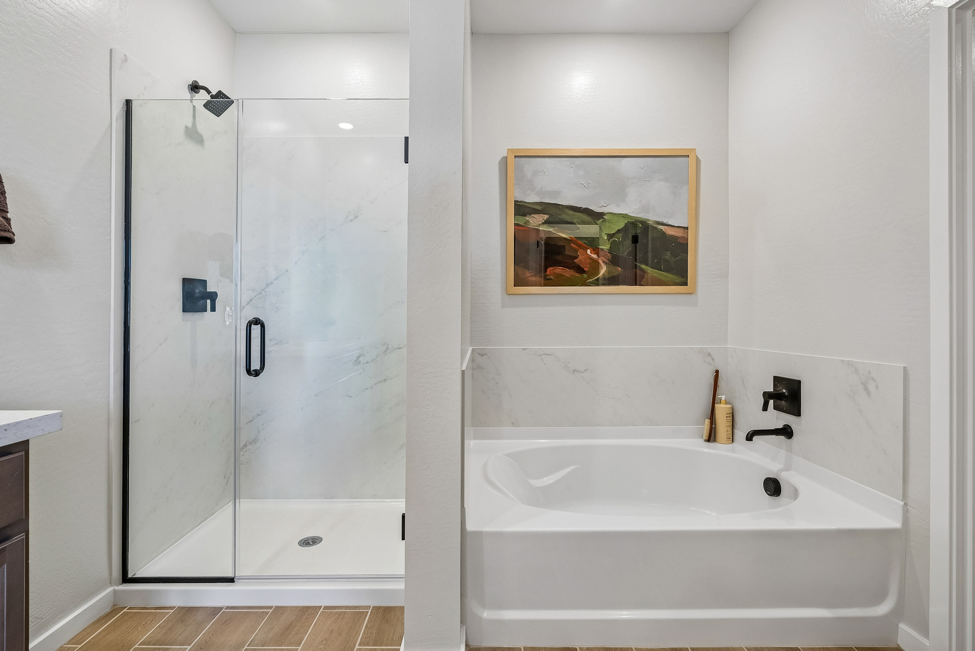A bathroom with a glass shower.