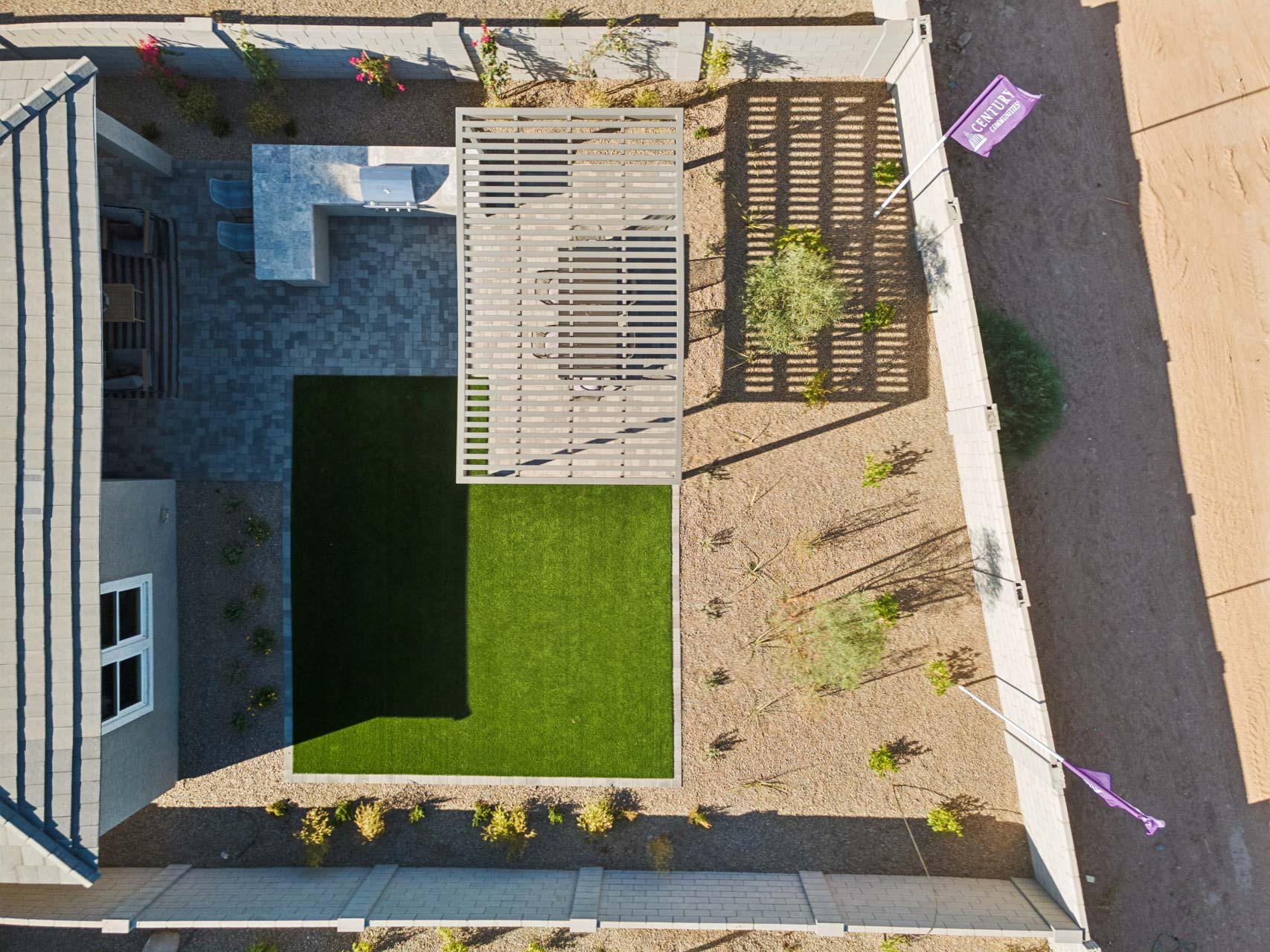 A house with a green lawn.