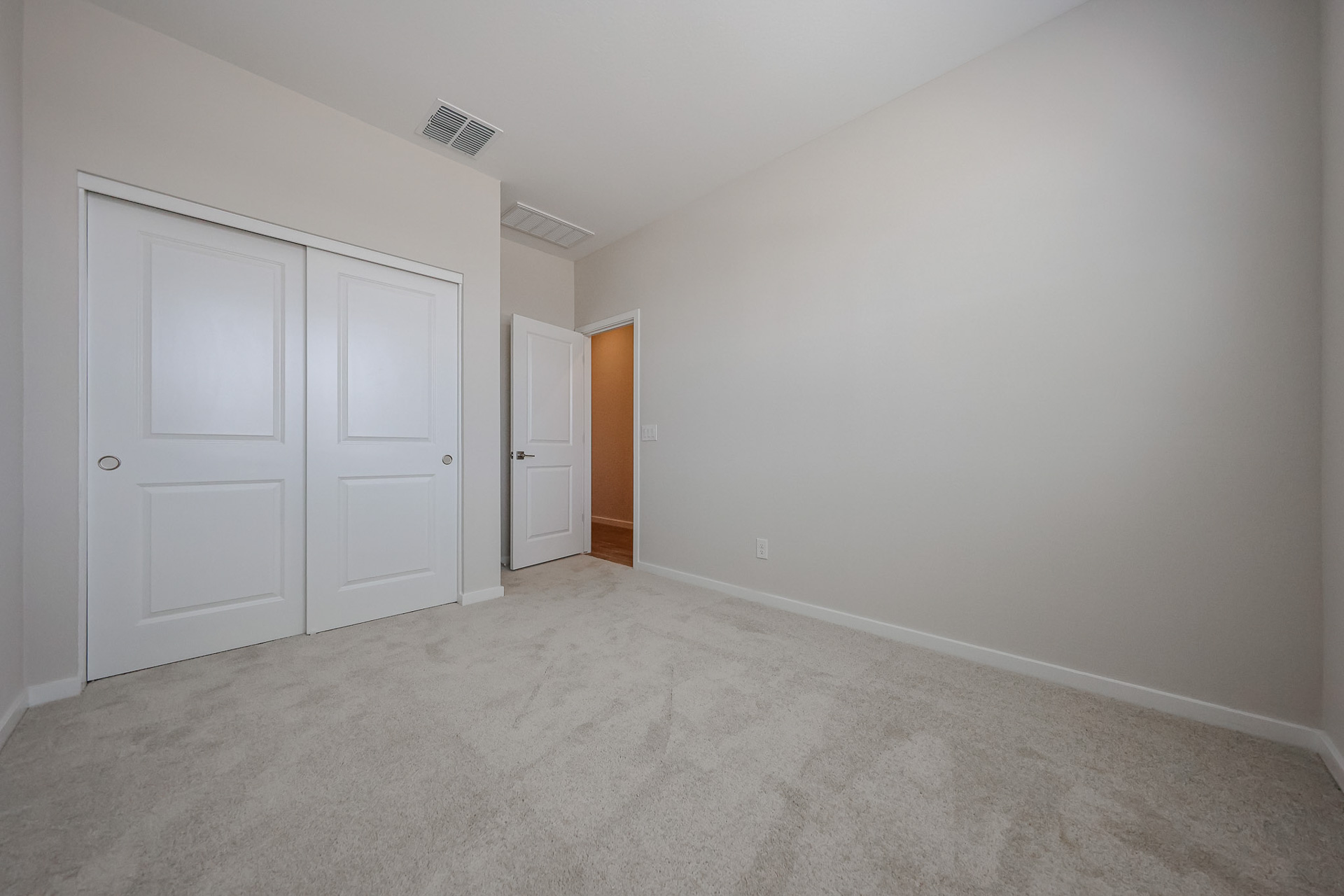 A room with white doors.