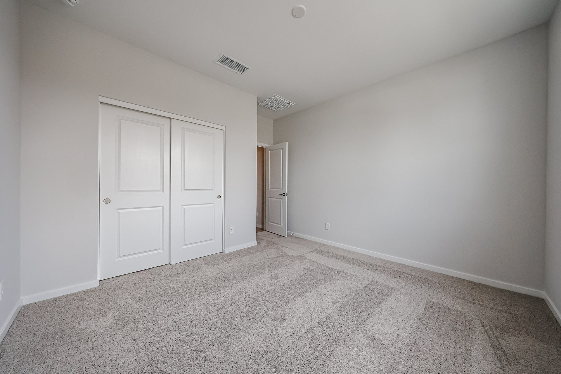 A room with white doors.