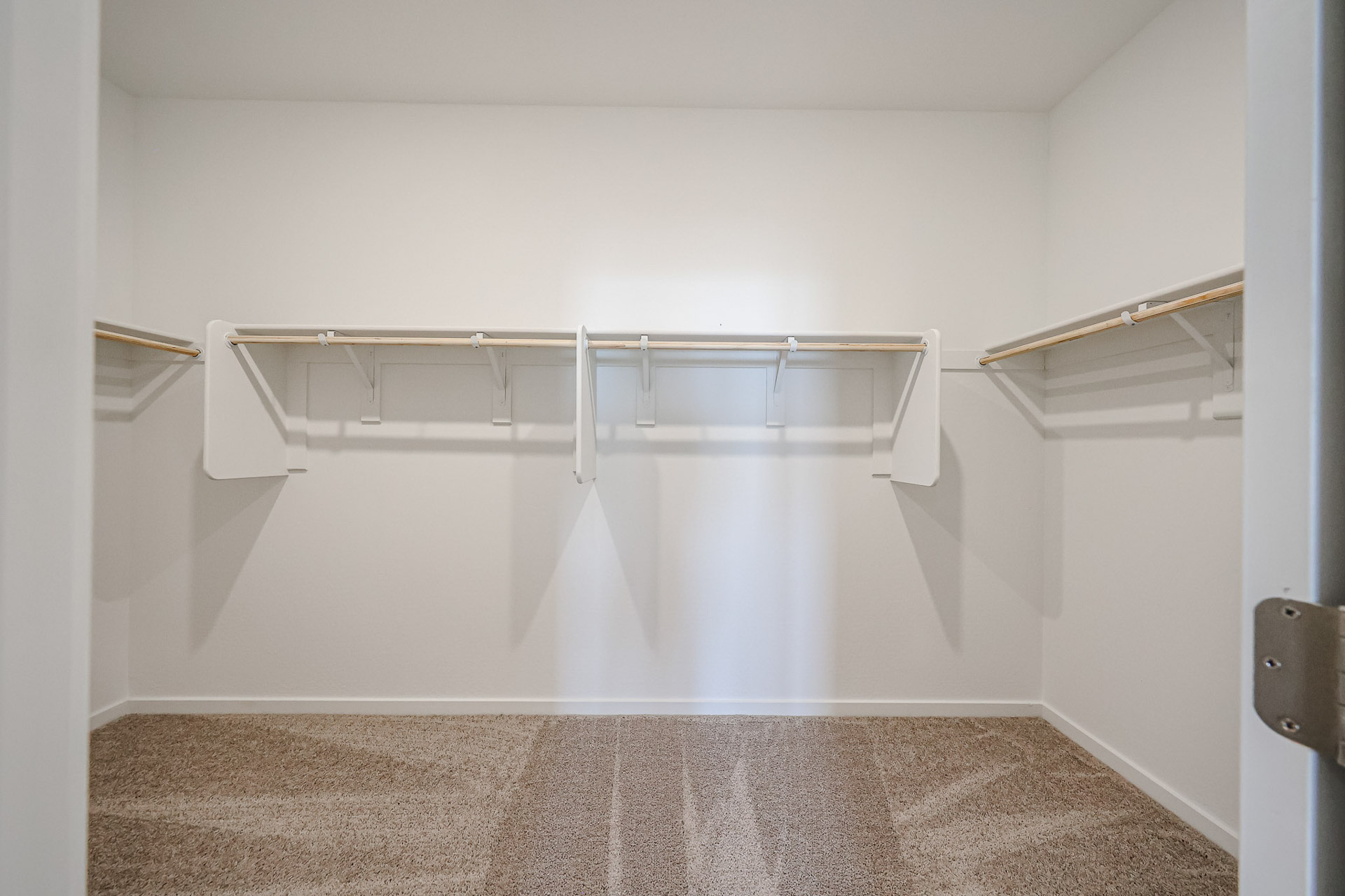 A white bathtub in a room.