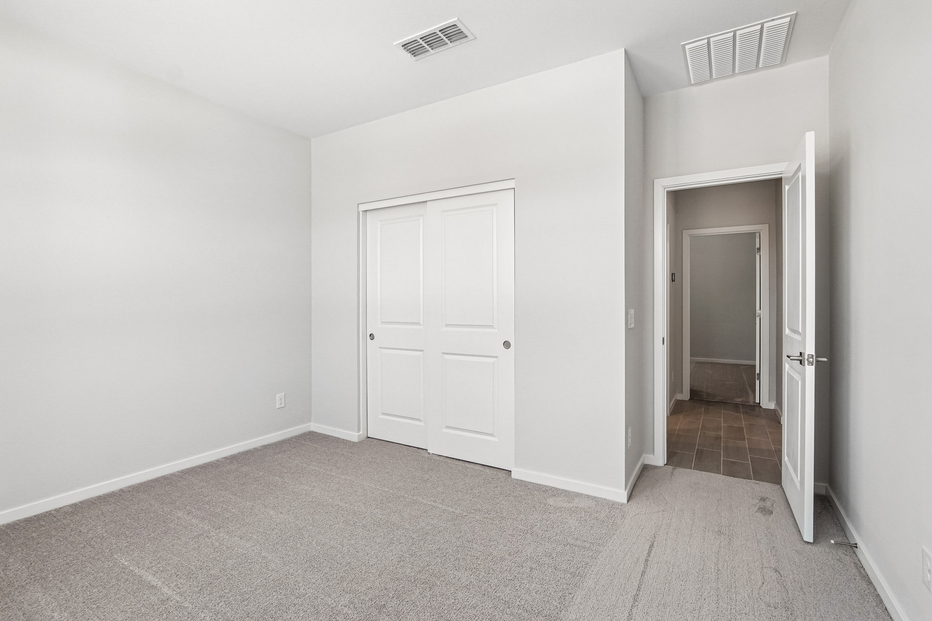 A room with white doors.