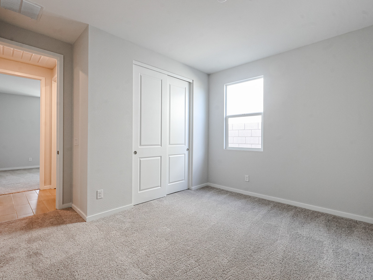 A room with white doors.