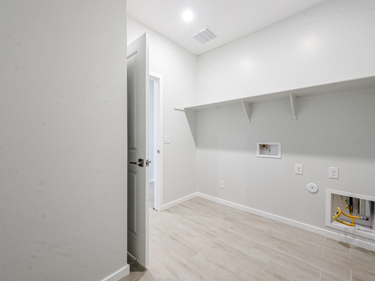 A room with a wood floor and a wood floor.