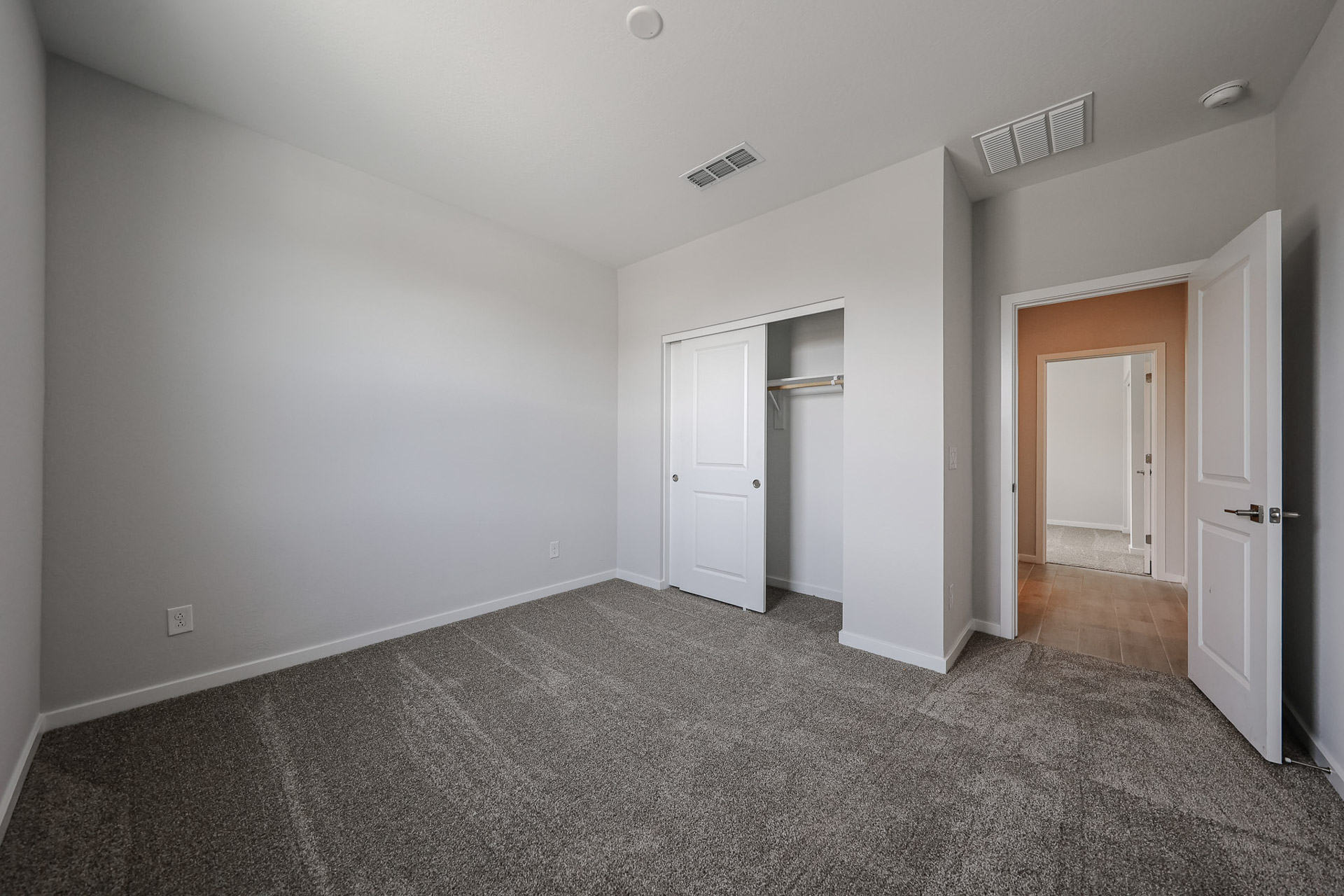 A room with white doors.