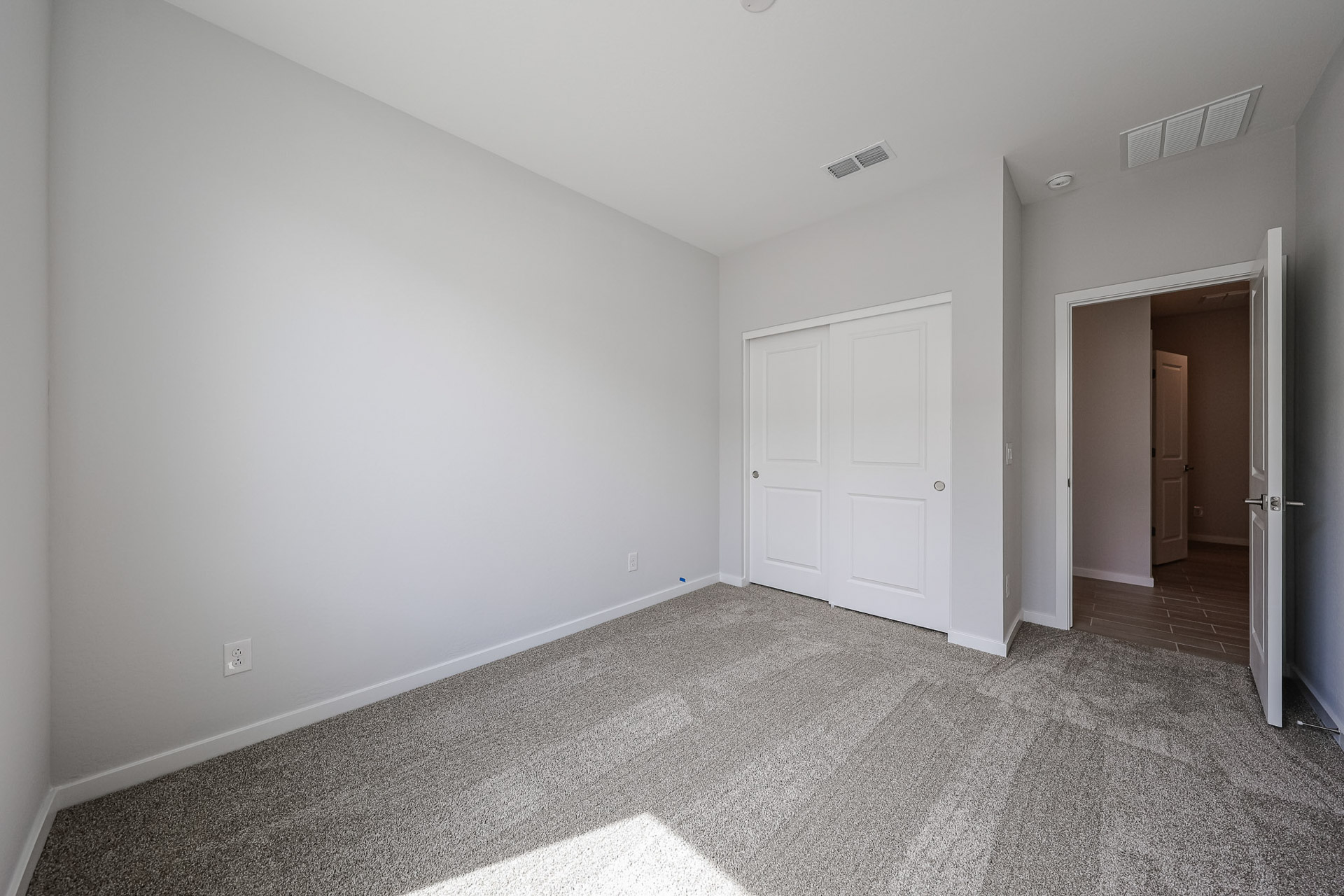 A room with white doors.