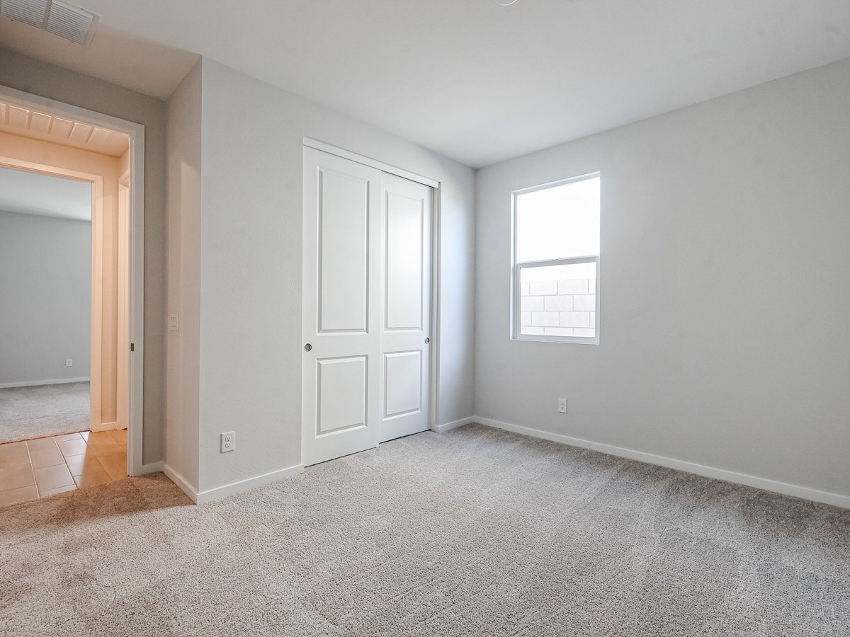 A room with white doors.