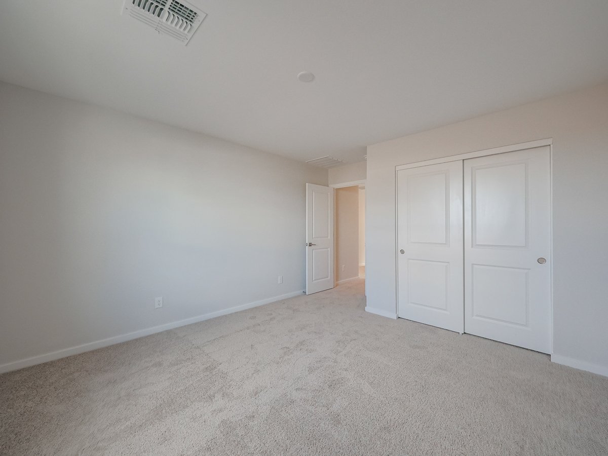 A room with white doors.