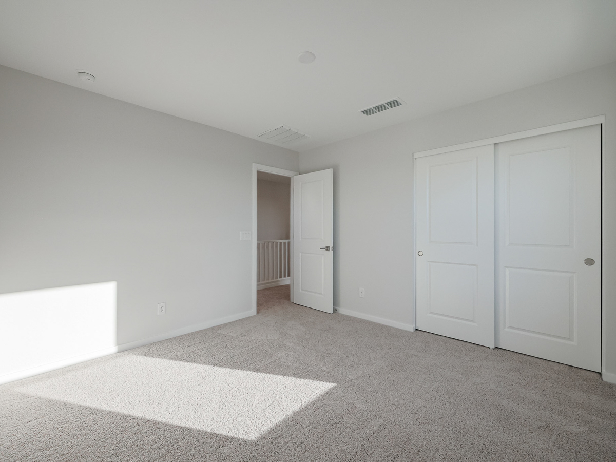 A room with white doors.