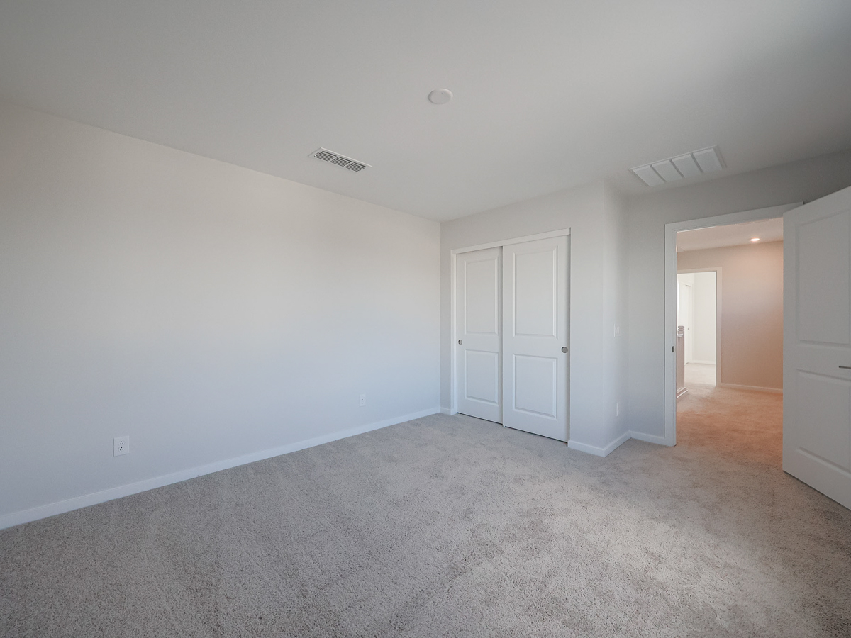 A room with white doors.