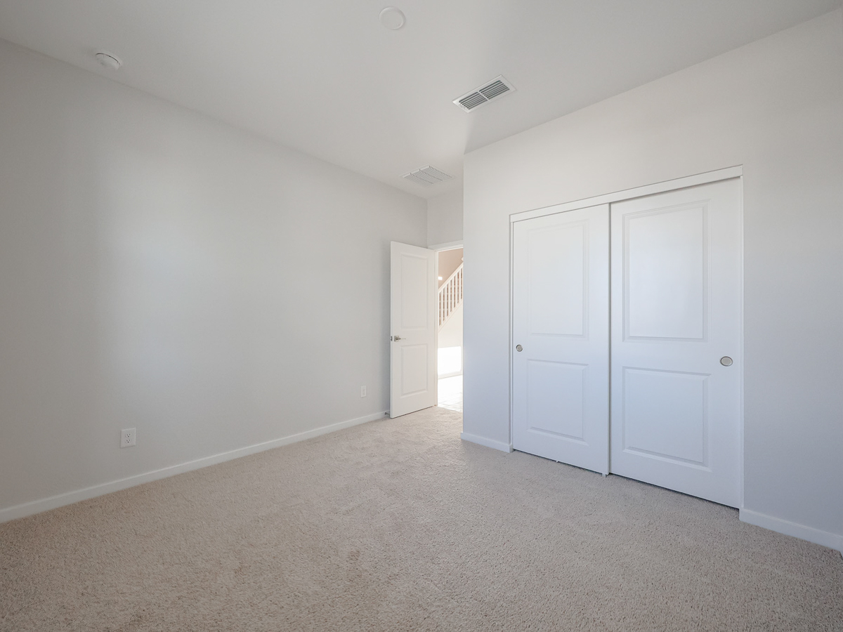 A room with white doors.