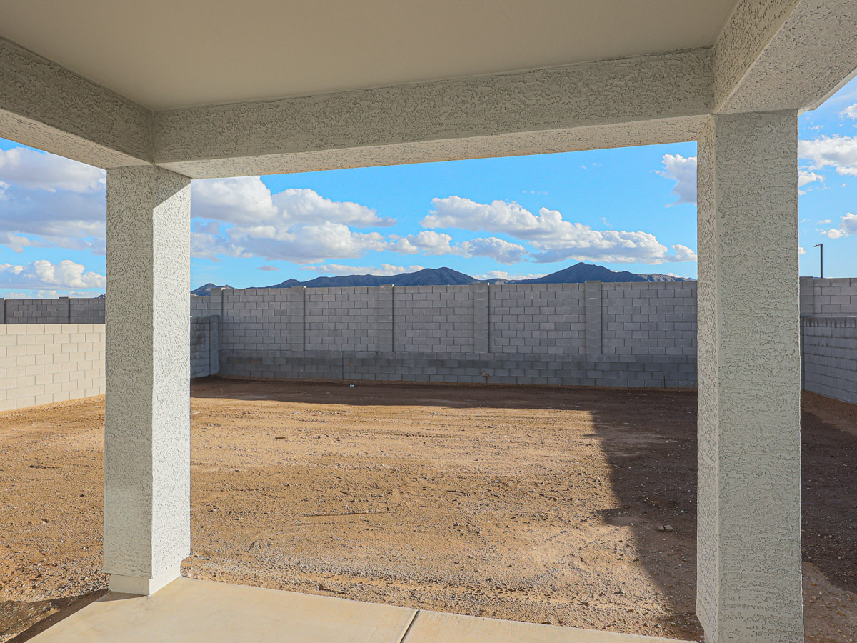 A view of a large building from a window.