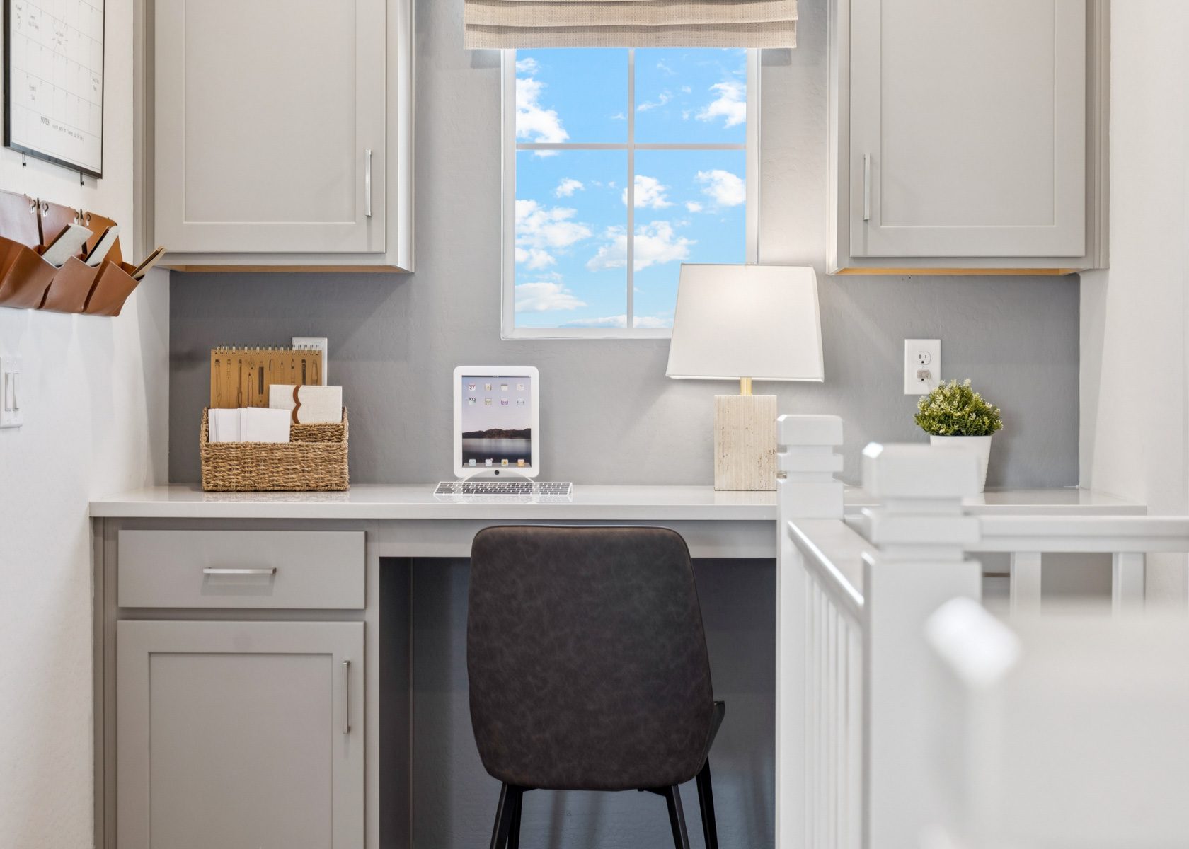 A kitchen with a chair and a table.