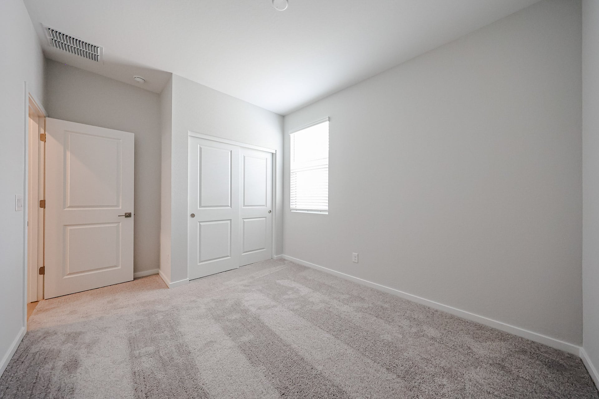 A room with white doors.