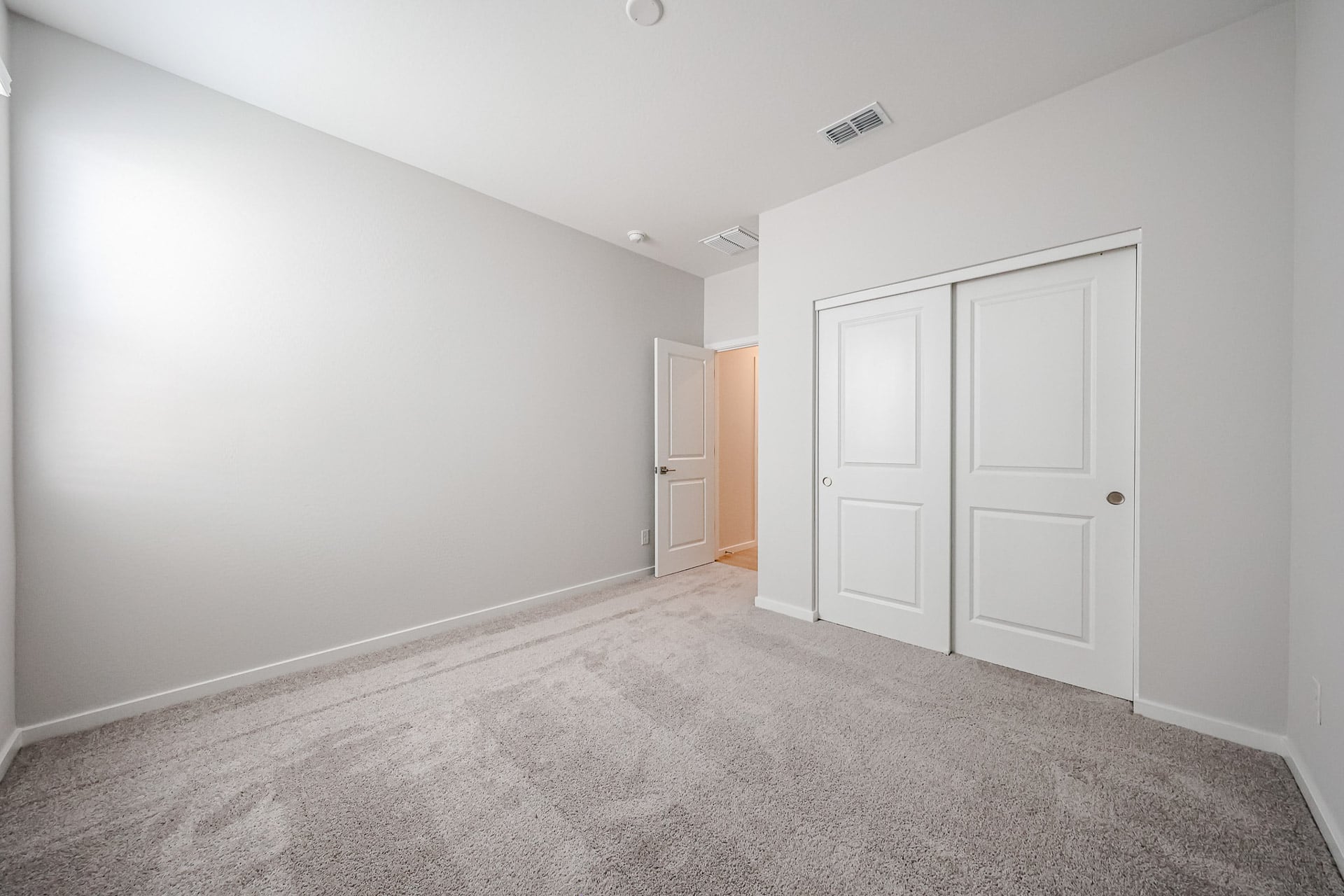 A room with white doors.
