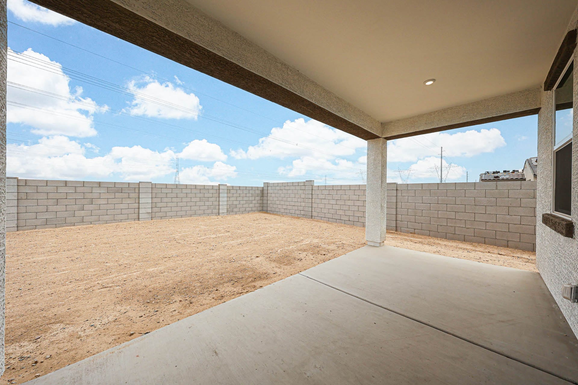 A concrete wall with a concrete floor.