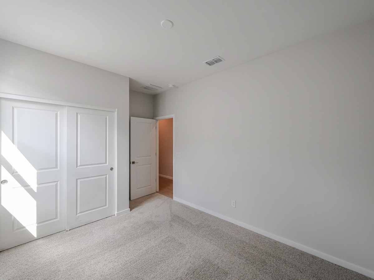 A room with white doors.